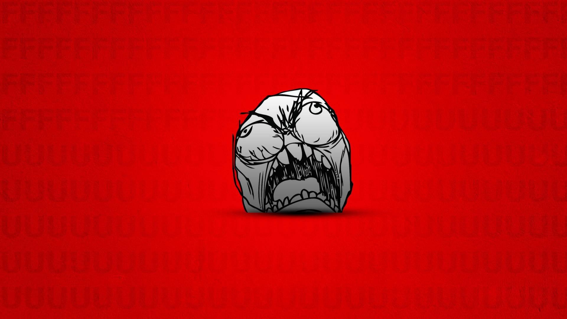 Troll 桌布 壁紙 — 一個卡通憤怒的臉，咬緊牙關，眼睛突出，在帶有重複文字圖案的鮮紅色背景上強烈凝視。
