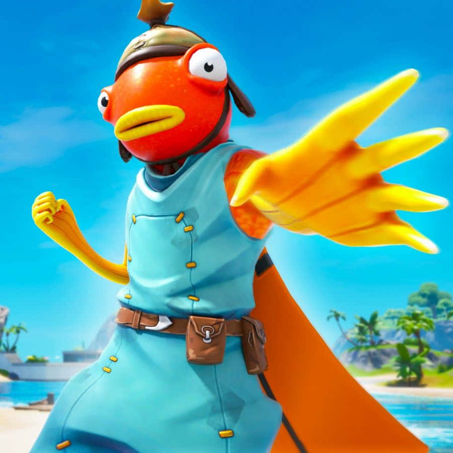 Fortnite 桌布 壁紙 — 一個卡通橙色魚角色穿著藍色服裝和帽子，在明亮的熱帶海灘背景下擺出動態姿勢。