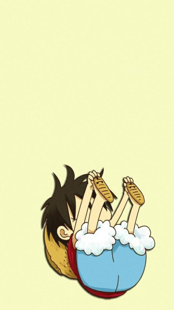 動漫男孩 桌布 壁紙 — 一個卡通男孩，頭髮尖尖，倒掛在泡泡浴中，拿著兩塊餅乾放鬆。