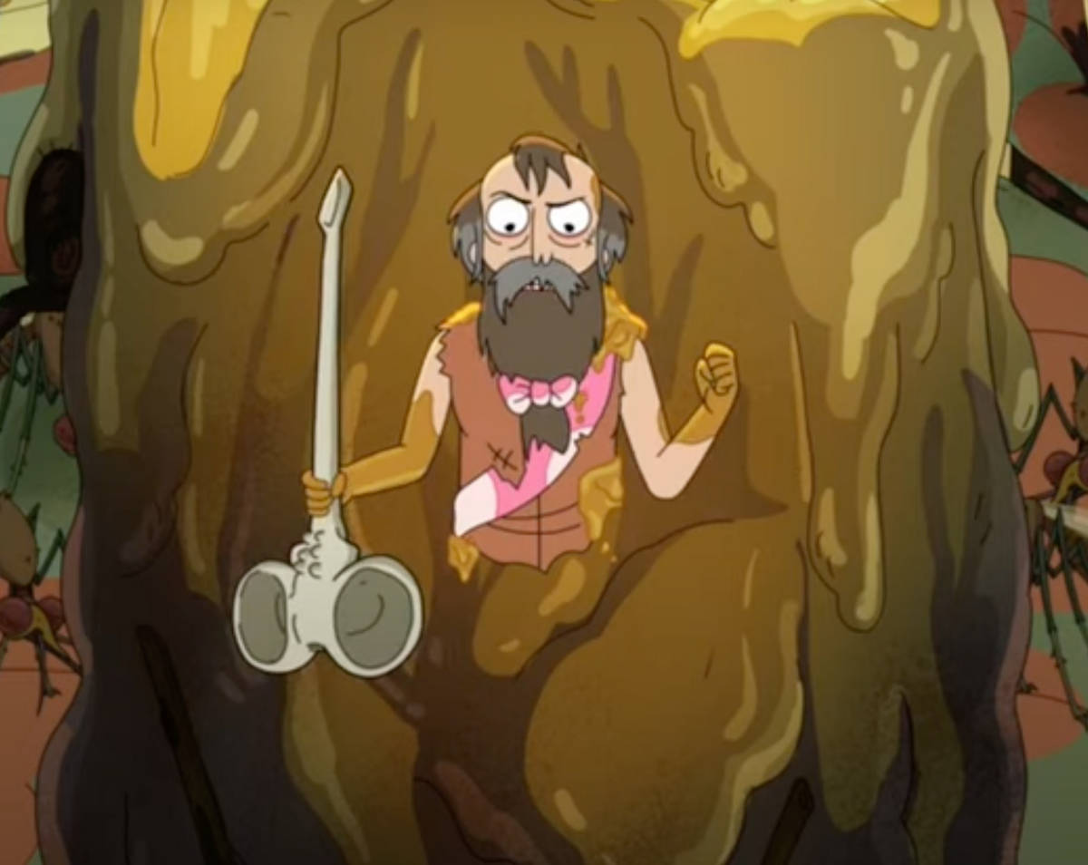 Animated 桌布 壁紙 — 一個卡通穴居人，留著鬍子，打著領結，挑釁地站在蜂巢狀洞穴中，手持骨棒。