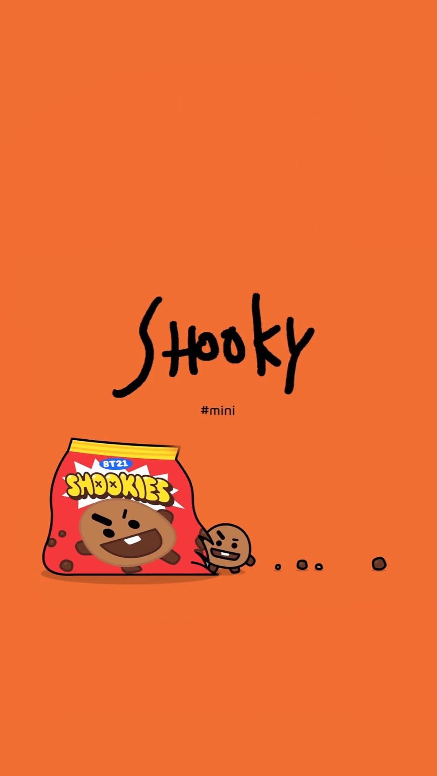 shooky bt21 桌布 壁紙 — 一個卡通餅乾角色從一個標有 'Shookies' 的紅色零食袋中爆出，背景為純橙色。
