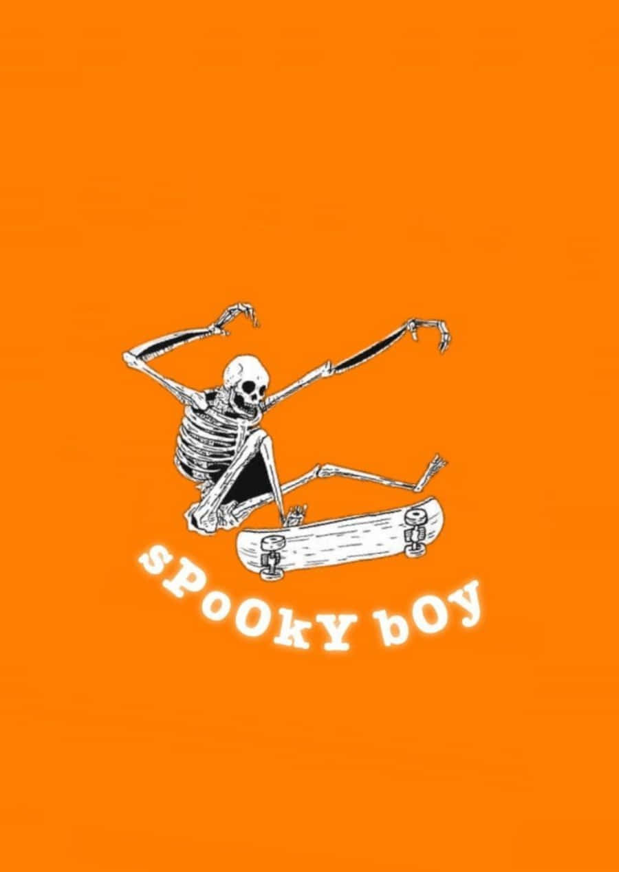 Spooky 桌布 壁紙 — 一個卡通骷髏在純橙色背景上玩滑板，下方有「spooky boy」文字。