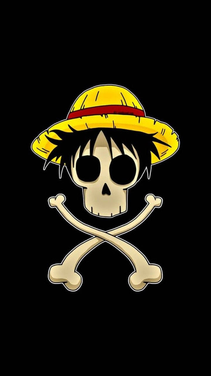 Luffy 桌布 壁紙 — 一個卡通骷髏頭，黑色頭髮，戴著黃色草帽，坐在黑色背景上的交叉骨頭上。