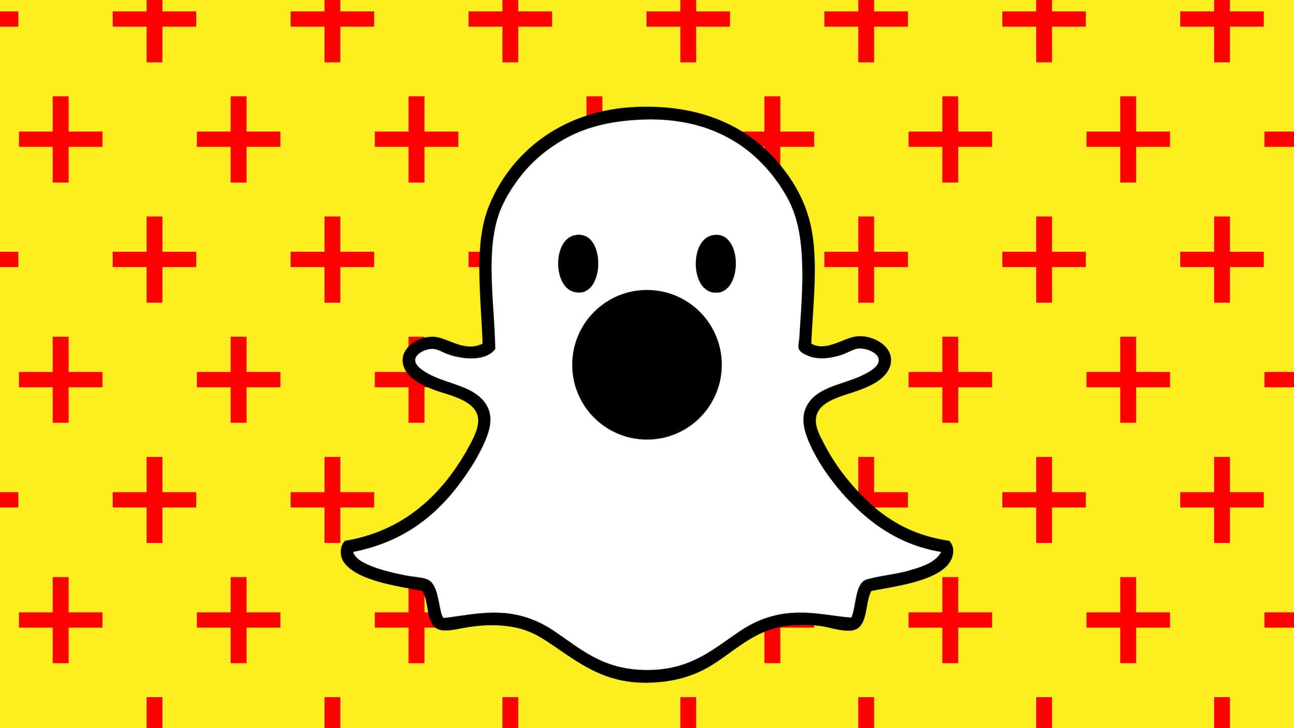 Snapchat 桌布 壁紙 — 一個卡通鬼魂，有大黑嘴巴和眼睛，漂浮在充滿紅色十字架的亮黃色背景上。