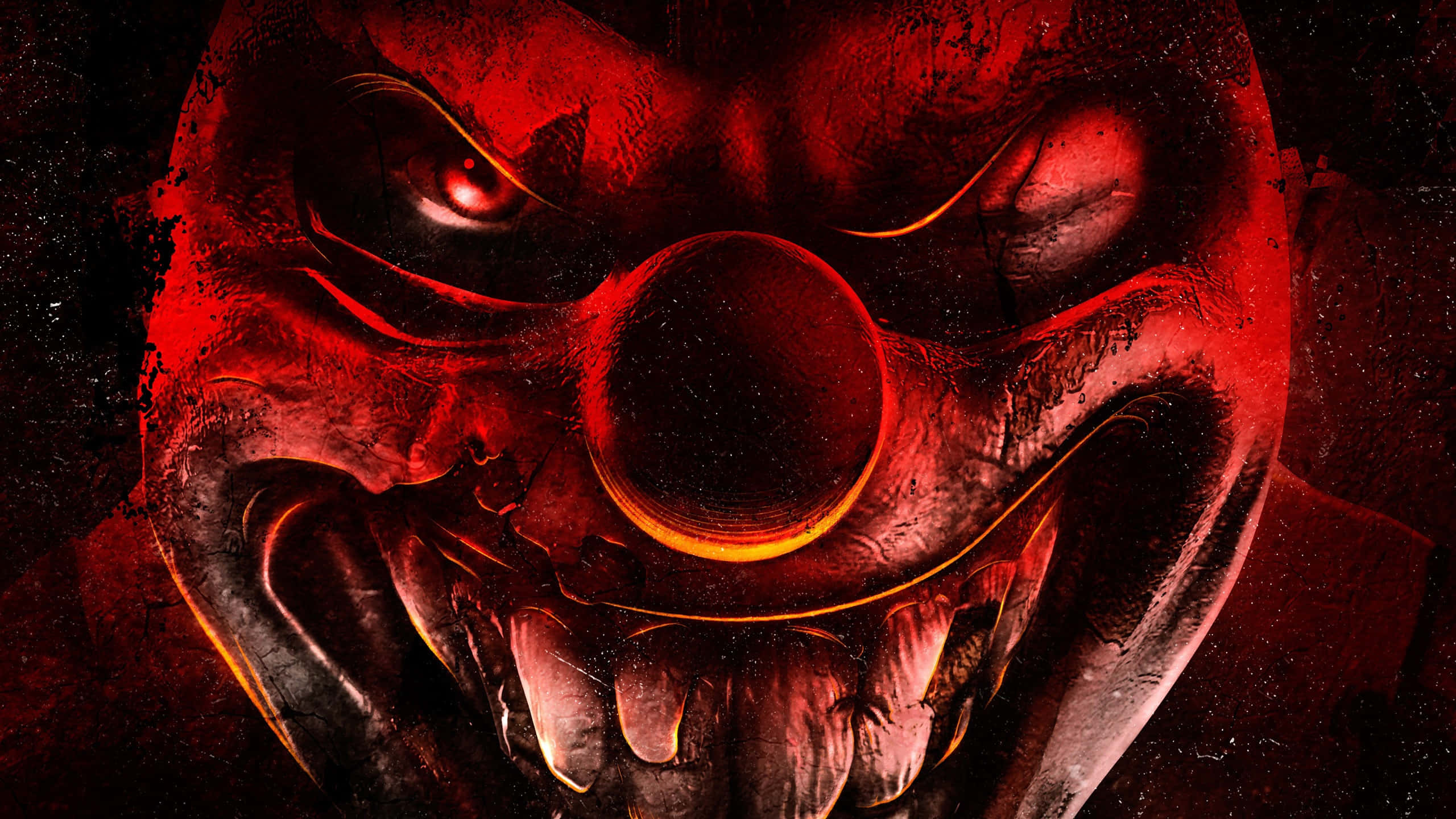 Red Gaming 桌布 壁紙 — 一個可怕的小丑臉孔，有著發光的紅色眼睛和寬闊的笑容，在邪惡的紅色燈光下露出鋒利的牙齒。