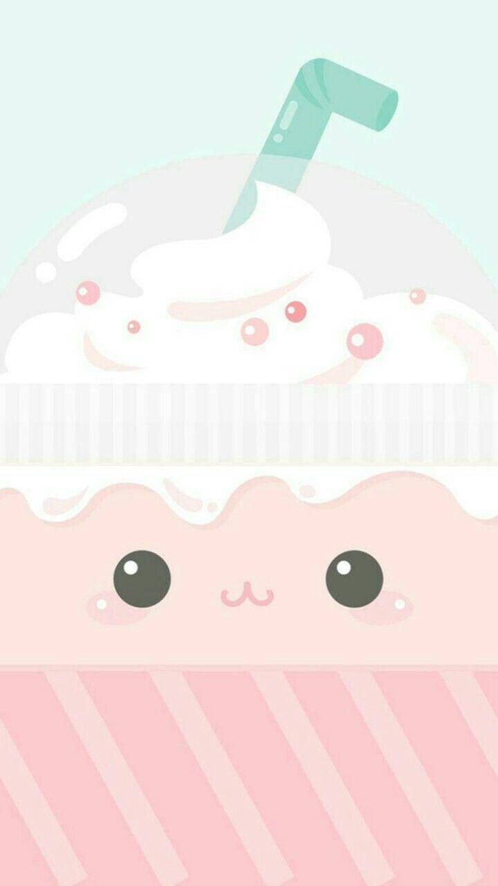 Kawaii iPhone 桌布 壁紙 — 一個可愛的卡哇伊風格粉紅色奶昔，配有鮮奶油和吸管，杯上有一個笑臉。