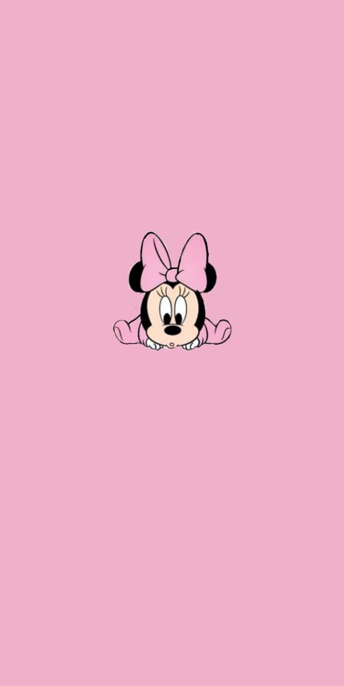 Minnie Mouse Pink 桌布 壁紙 — 一個可愛的卡通小Minnie Mouse從純粉紅色背景中探出頭來，戴著粉紅色蝴蝶結。