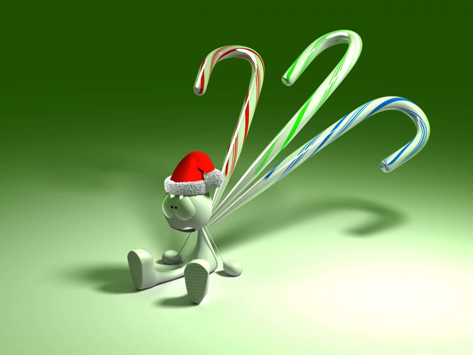 3d Christmas 桌布 壁紙 — 一個可愛的白色卡通角色戴著紅色聖誕帽，坐在綠色漸變背景前，有三個巨大的拐杖糖翅膀。