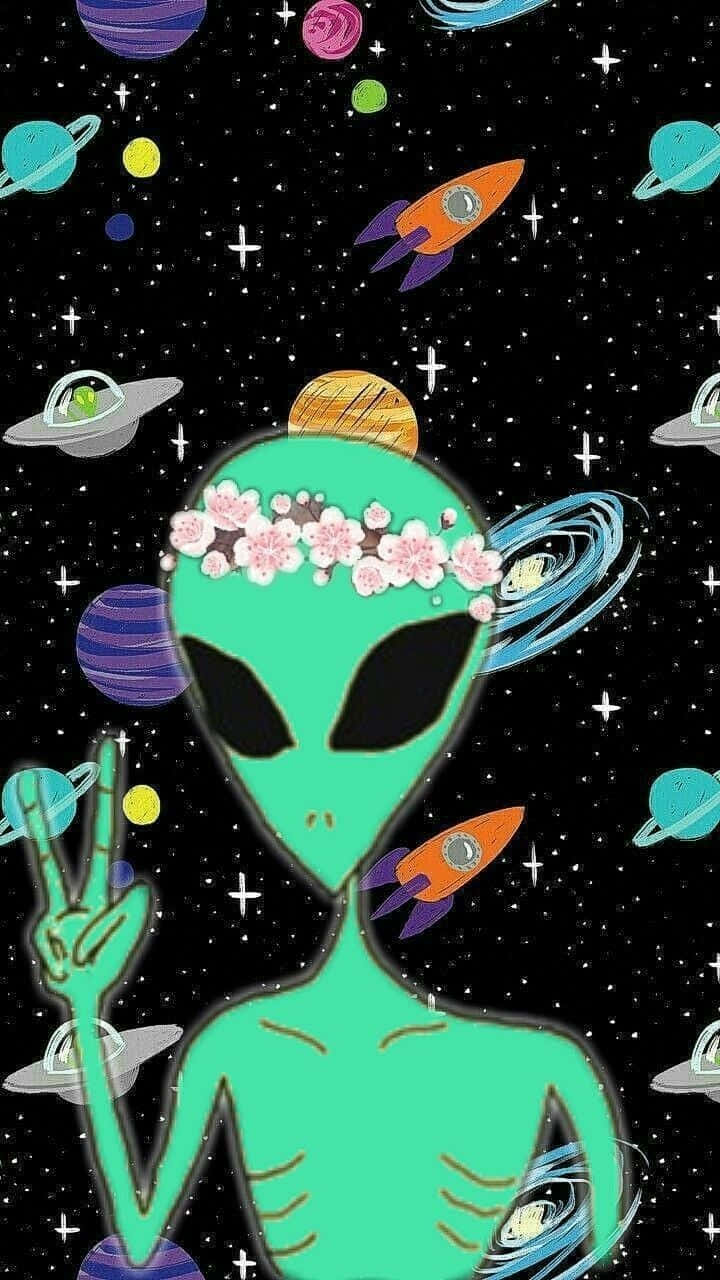 Et 桌布 壁紙 — 一個可愛的綠色外星人戴著櫻花頭帶，在充滿行星和火箭的彩色宇宙場景中揮手和平。