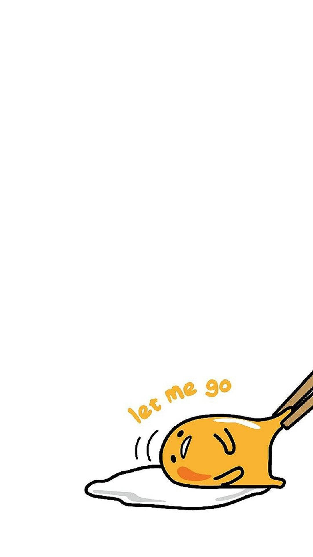 Gudetama Aesthetic 桌布 壁紙 — 一個可愛的黃色卡通雞蛋被筷子夾起，上面有「放我走」的文字。
