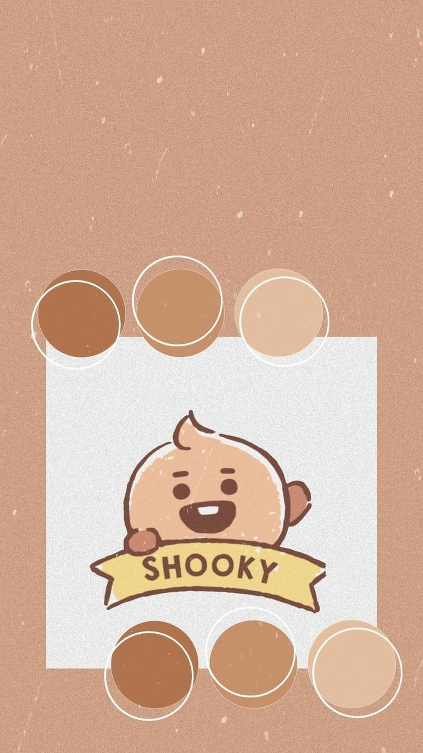 shooky bt21 桌布 壁紙 — 一個名叫 Shooky 的開朗卡通角色從一個白色盒子中探出頭來，盒子周圍是圓形的棕色色板，背景是帶有紋理的米色。