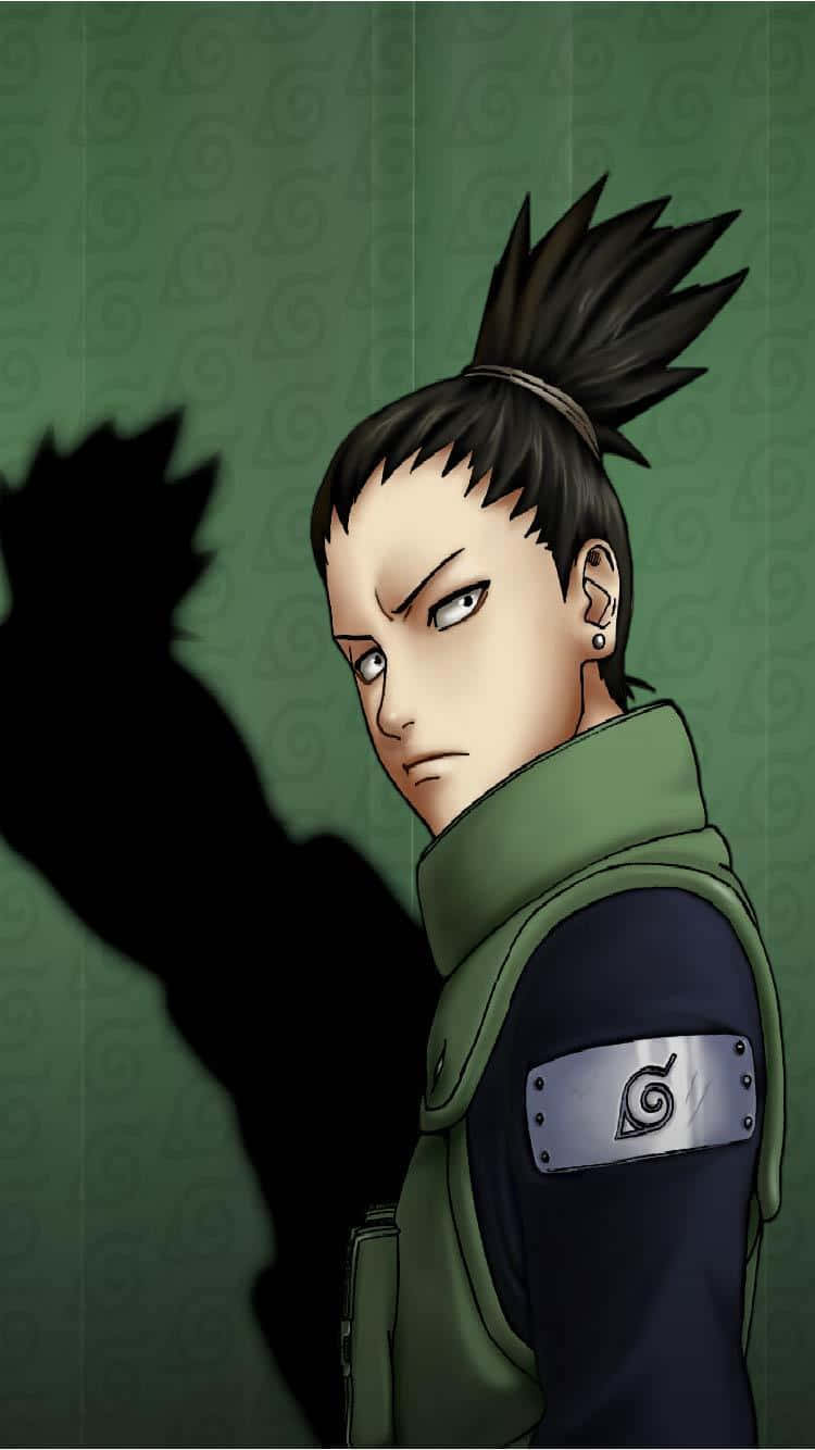 Naruto Green 桌布 壁紙 — 一個嚴肅的動漫忍者，有著尖刺的黑髮和綠色背心，站在有圖案的綠色牆壁前，投射出銳利的陰影。