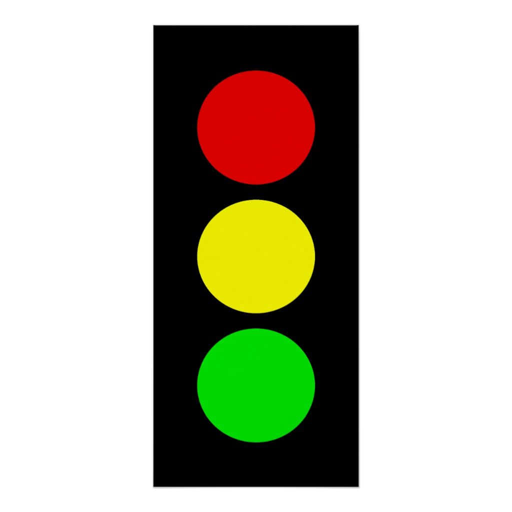 Stop Light 桌布 壁紙 — 一個垂直交通號誌，黑色長方形外殼內有紅色、黃色和綠色的圓形燈光。