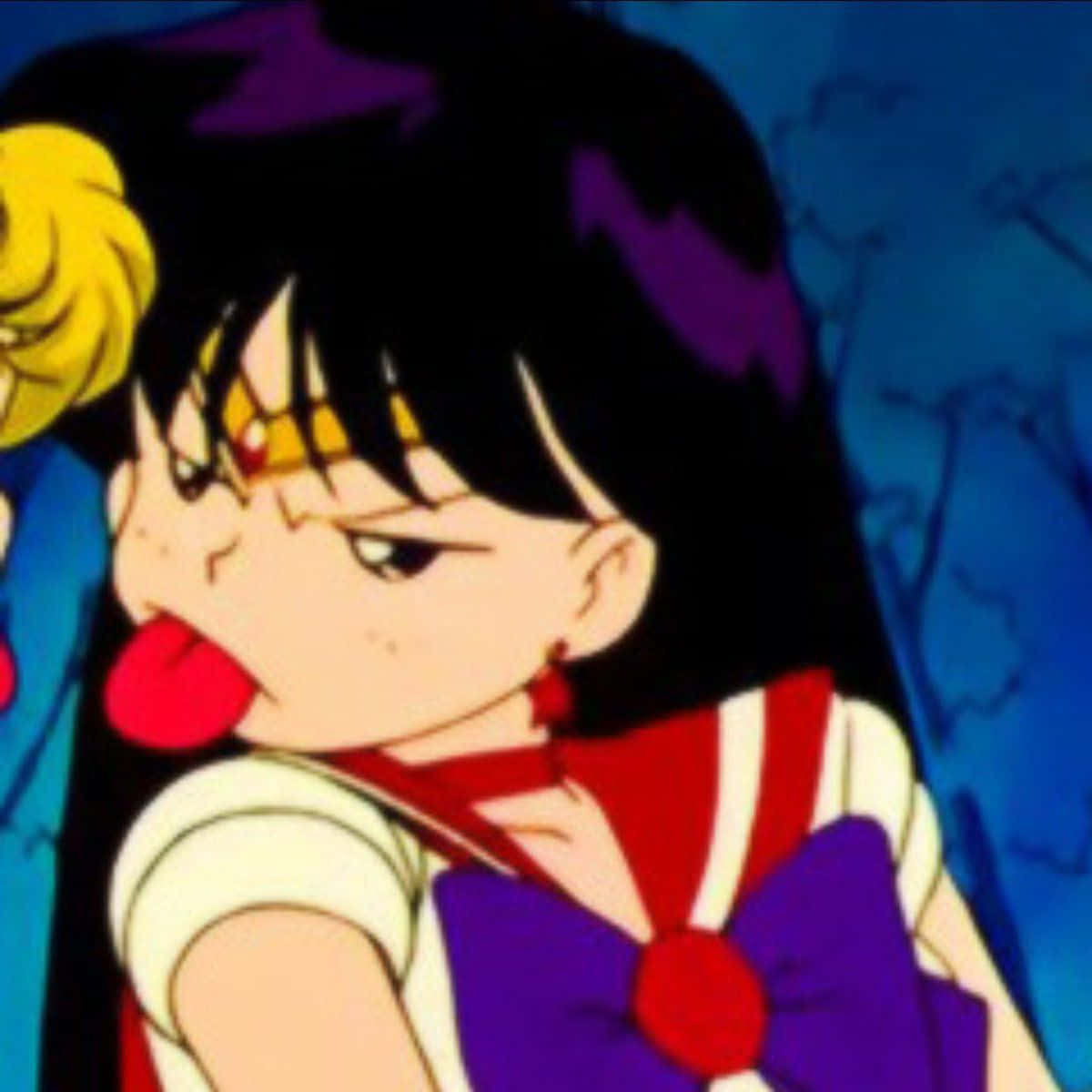 穿著水手服的動漫女孩伸出舌頭，表情堅定。 — 美少女戰士 GIF 壁紙
