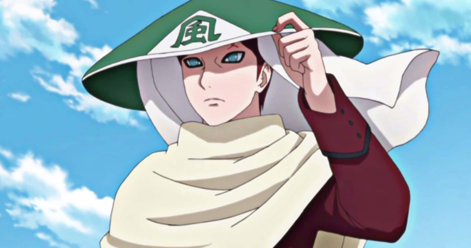 Naruto Kage 桌布 壁紙 — 一個堅定的動漫忍者，戴著綠色風主題帽子和白色圍巾，站在有蓬鬆雲朵的明亮藍天下。