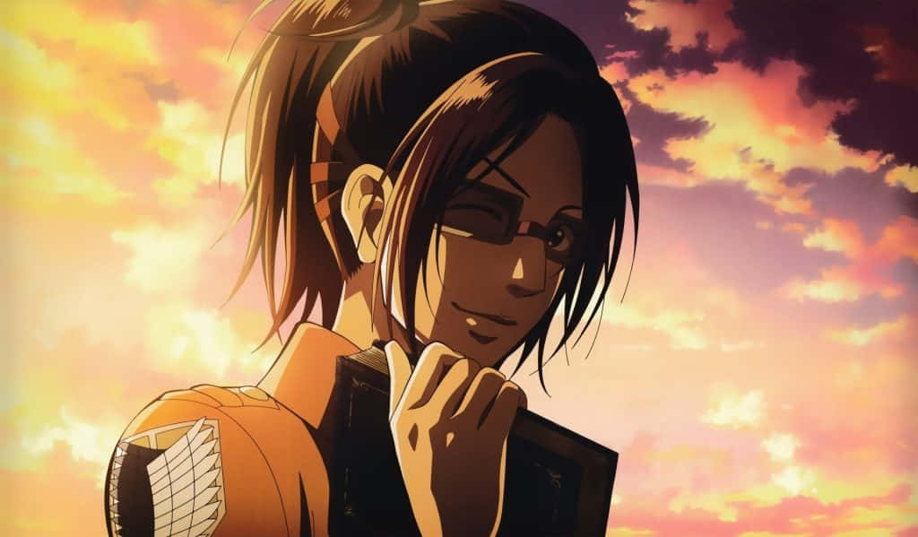 Sad Anime Death 桌布 壁紙 — 一個堅定的動漫角色穿著黃色制服，站在充滿活力的日落天空前，天空中有溫暖的橙色和粉紅色雲彩。