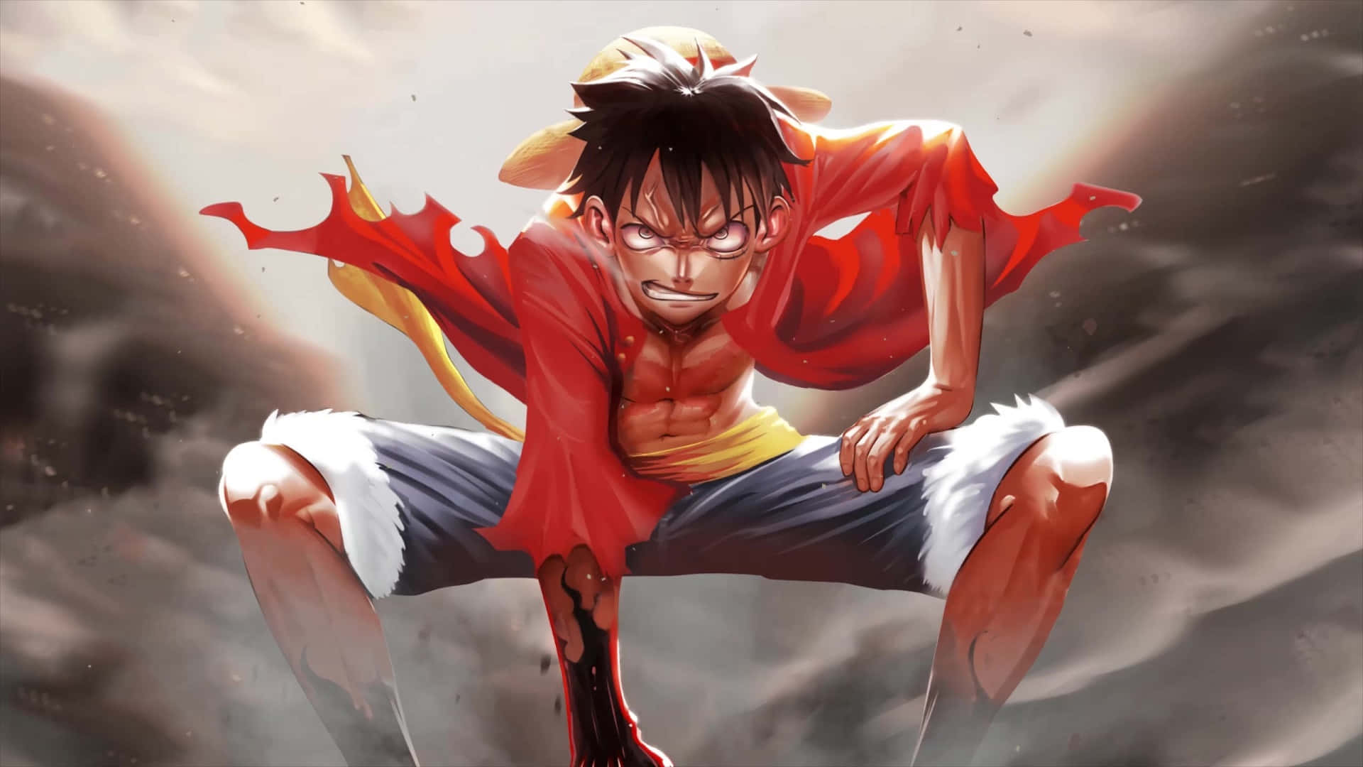 Luffy 桌布 壁紙 — 一個堅定的動畫海盜，擁有尖刺黑髮和紅色外套，在暴風雨的灰色背景下蹲伏在半空中。
