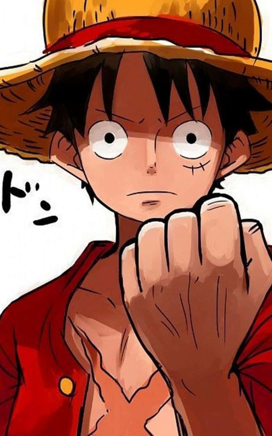 Cool Luffy 桌布 壁紙 — 一個堅定的動畫男孩，戴著草帽和紅色外套，握緊拳頭，表情兇猛。