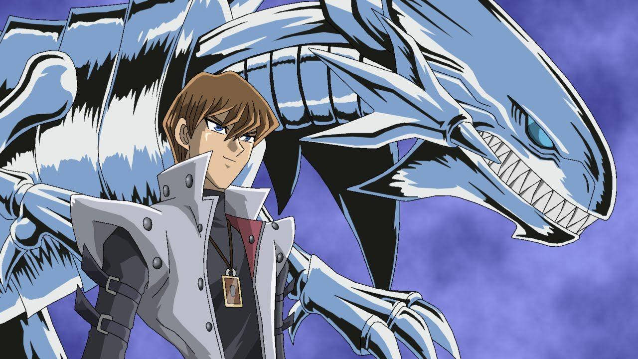 kaiba 桌布 壁紙 — 一個堅定的動畫男孩自信地站在他巨大的藍色裝甲龍旁邊，背景是暴風雨般的紫色天空。