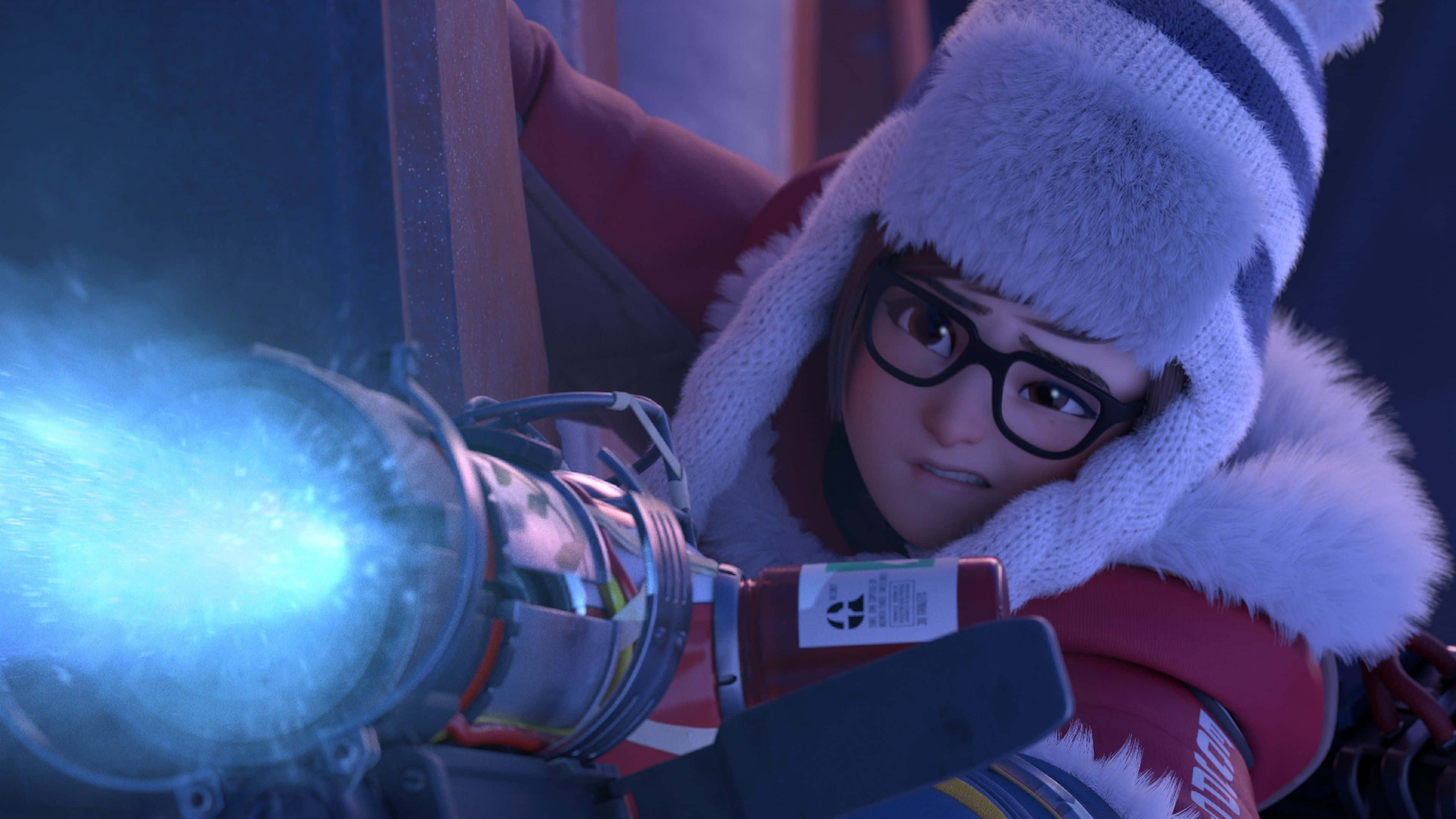 Overwatch Mei 桌布 壁紙 — 一個堅定的動畫角色穿著冬季裝備，以強烈的專注力瞄準一把發光的藍色武器。