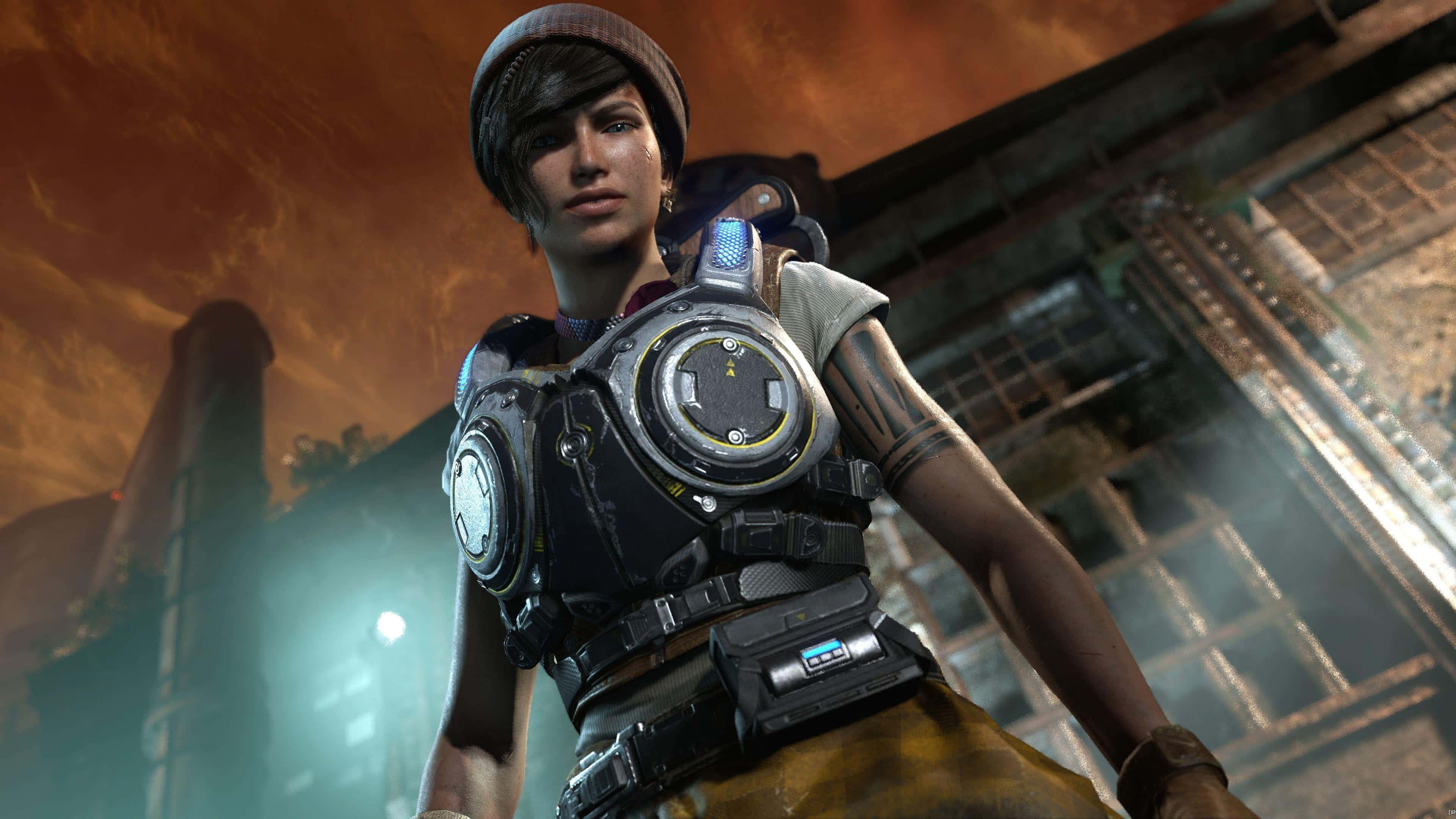 1920x1080 Gears Of War 5 桌布 壁紙 — 一個堅定的女性角色穿著未來風格的盔甲，站在煙霧瀰漫的廢墟城市景觀中，天空呈現橙色。