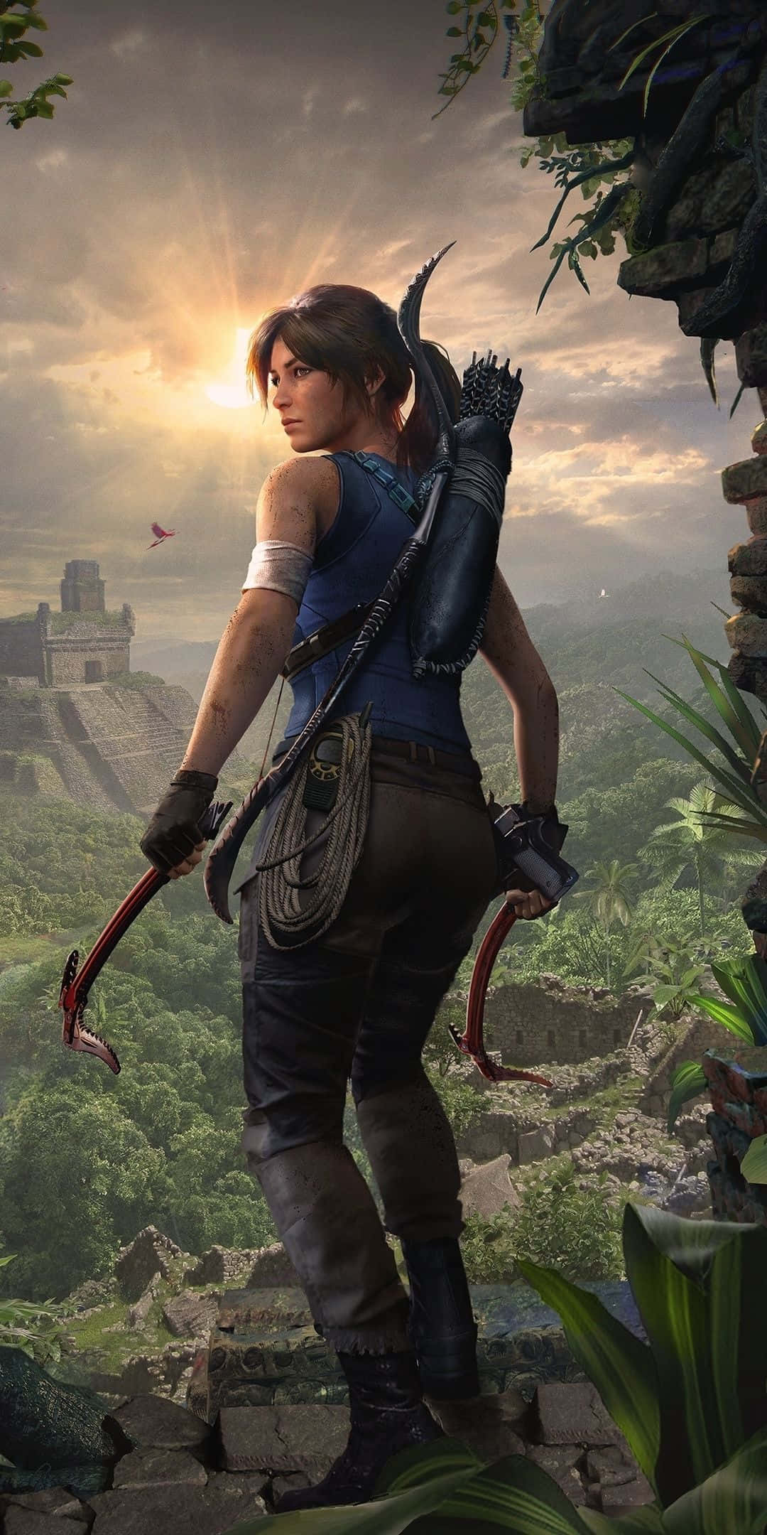 Pixel 3 Shadow Of The Tomb Raider 桌布 壁紙 — 一個堅定的探險家站在古老廢墟上，周圍是茂密的叢林，遠處有寺廟，金色的陽光穿過雲層。