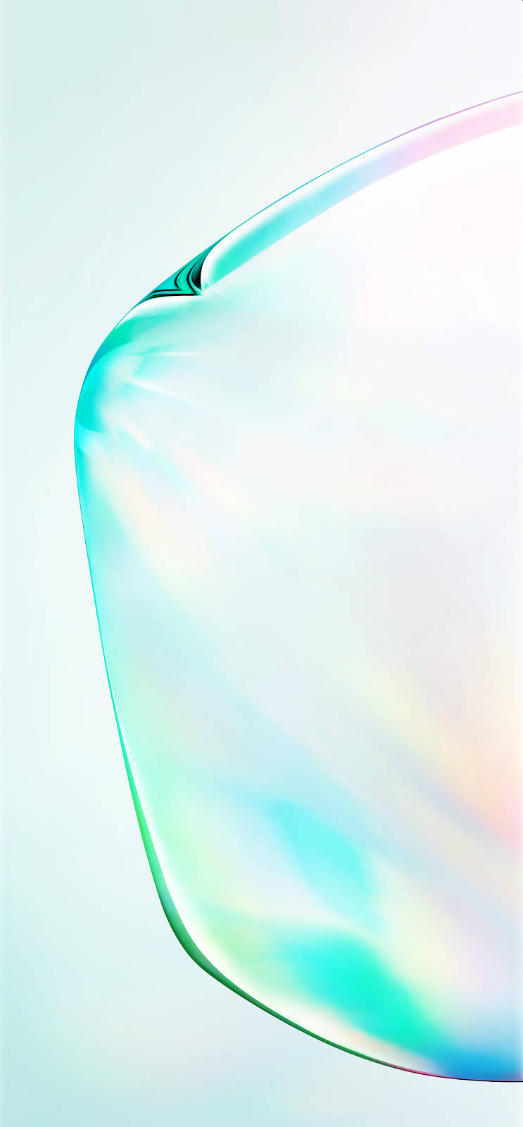 Note 10 桌布 壁紙 — 一個大型彩虹色泡泡在柔和粉彩背景上優雅彎曲，在柔和光線中反射彩虹色調。