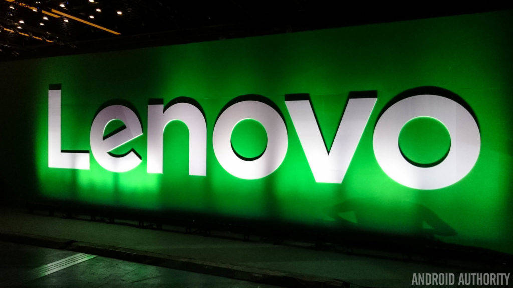 暗房綠色牆上發光的 Lenovo 標誌