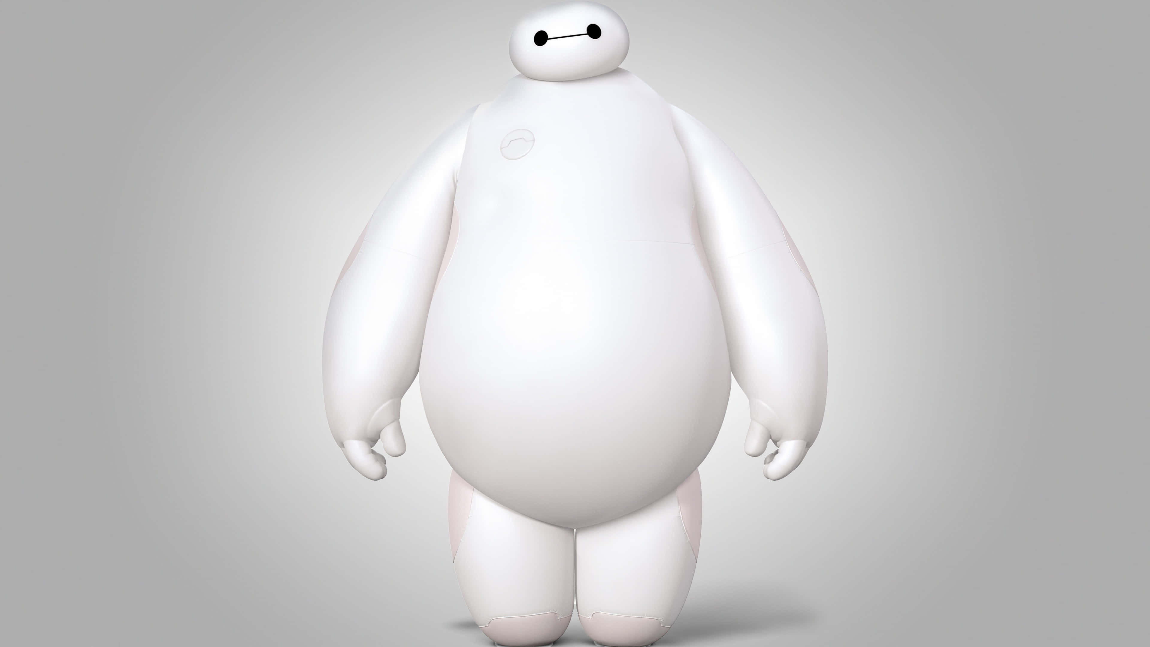 Animation Movies 桌布 壁紙 — 一個大型白色充氣機器人，帶有簡單的黑色眼睛，平靜地站在純灰色背景前。