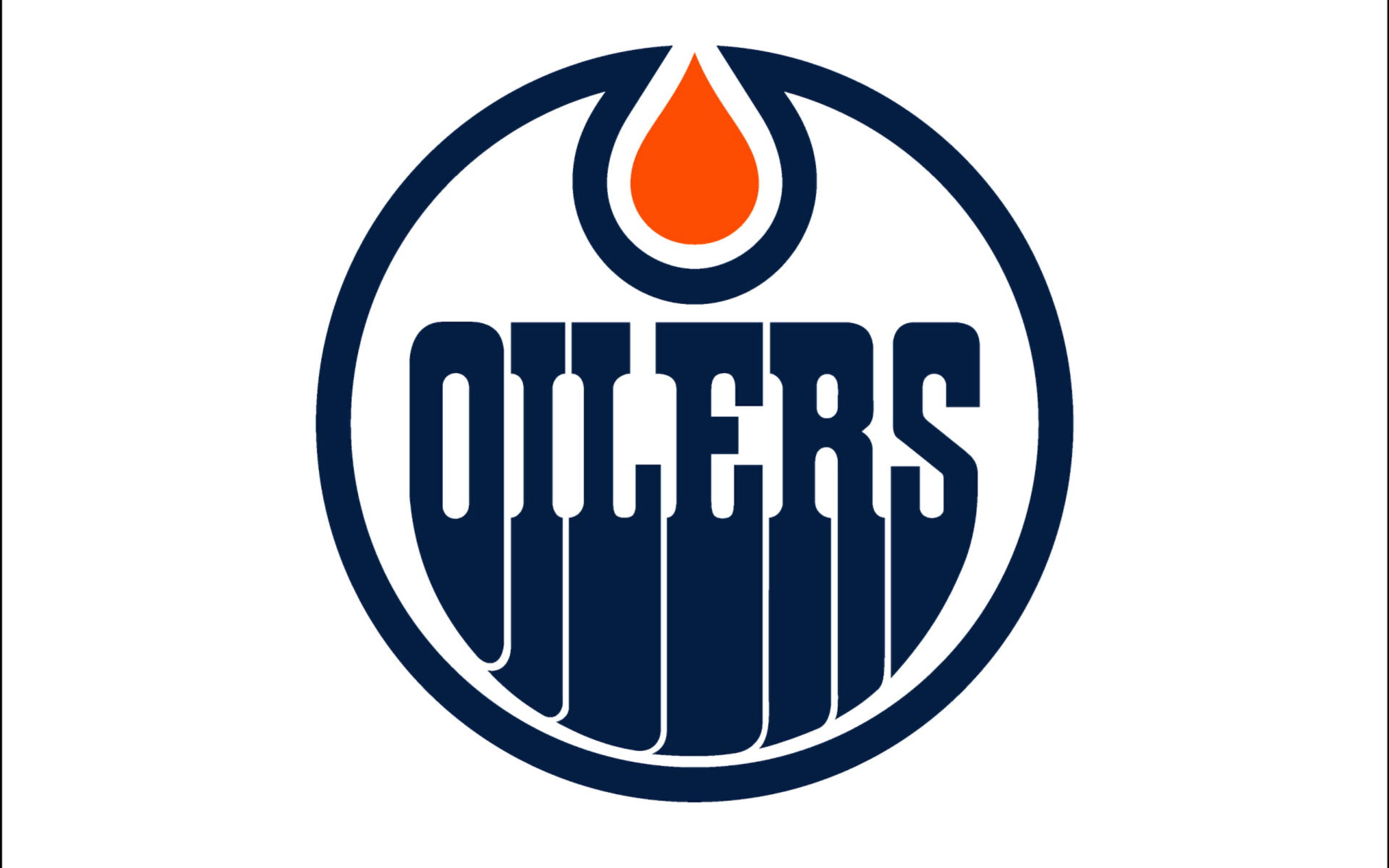 Oilers 桌布 壁紙 — 一個大膽的埃德蒙頓油人隊標誌，白色背景上圓形邊框內有海軍藍文字和橙色油滴。