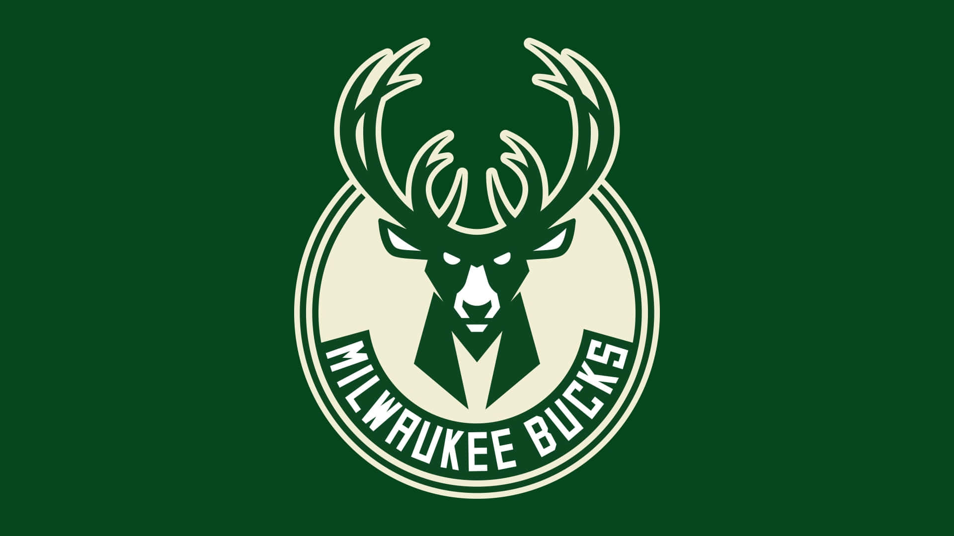 Milwaukee Bucks Logo 桌布 壁紙 — 一個大膽的密爾瓦基公鹿標誌，在純綠色背景上有一個奶油色的風格化鹿頭。