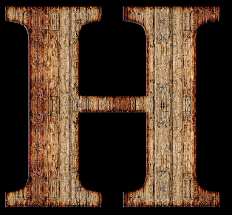Wood 桌布 壁紙 — 一個大膽的木製字母H，帶有風化紋理和燒焦邊緣，在純黑背景上格外突出。