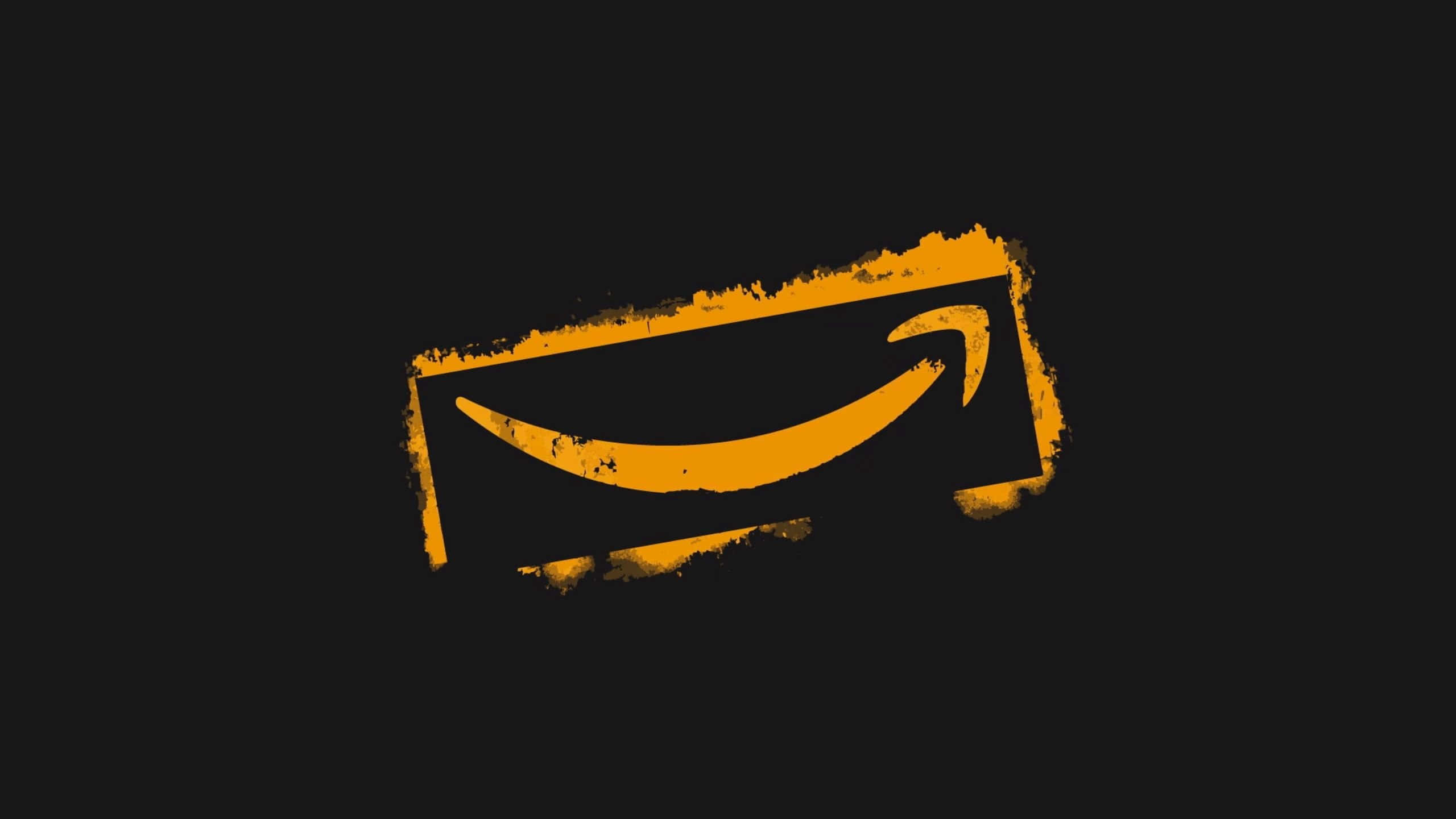亞馬遜 桌布 壁紙 — 一個大膽的橙色Amazon標誌，帶有磨損質感，在純黑色背景上脫穎而出。