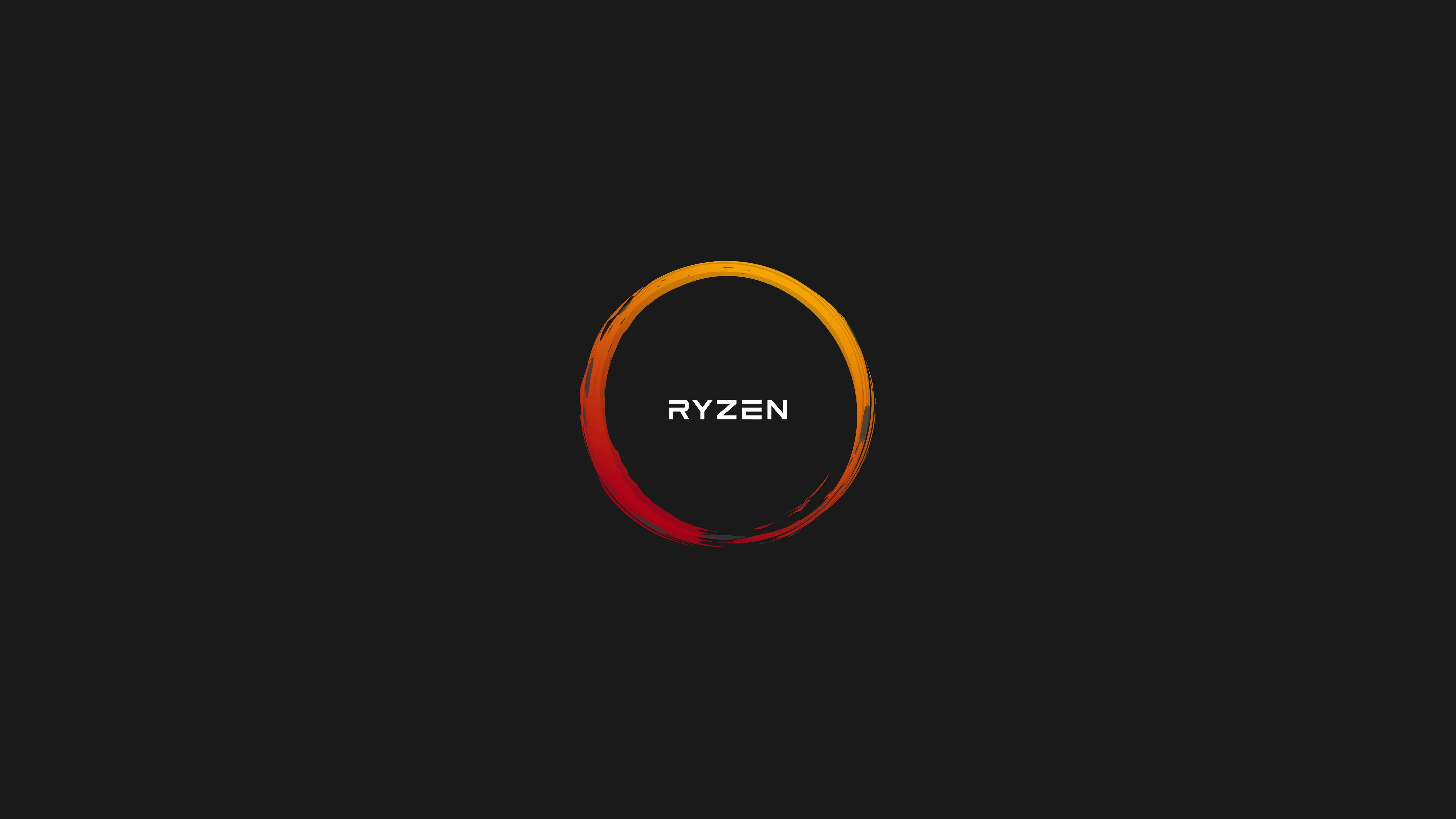 AMD 桌布 壁紙 — 一個大膽的火橙色和紅色圓形標誌，Ryzen 字樣居中，位於純黑色背景上。