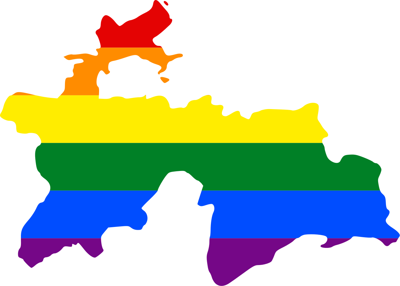 Tajikistan 桌布 壁紙 — 一個大膽的烏克蘭輪廓，在黑色背景上充滿了橫向彩虹條紋。