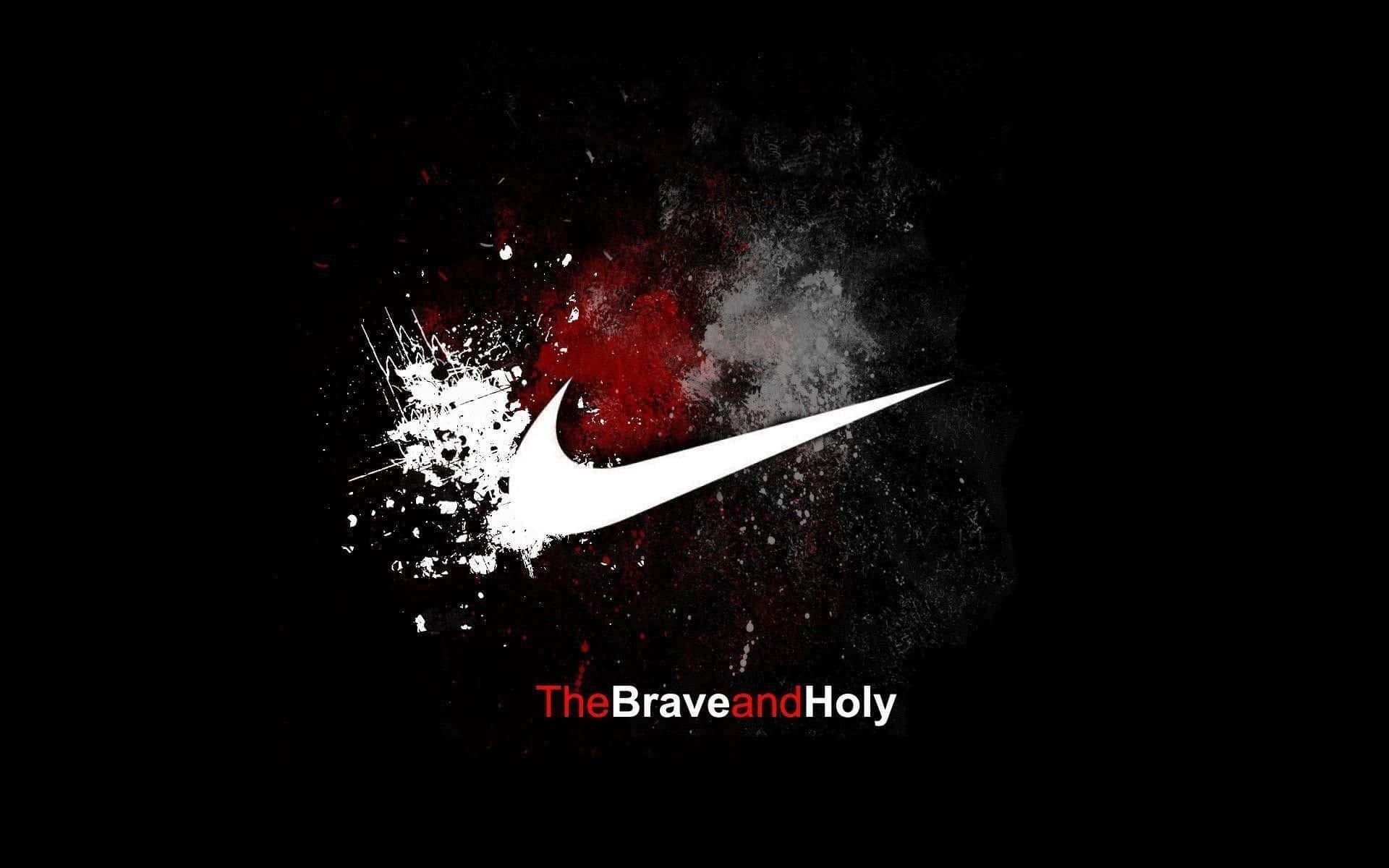 Nike Logo 桌布 壁紙 — 一個大膽的白色Nike勾勾從爆炸性的紅色和灰色飛濺中浮現，背景為純黑色，下方有文字TheBraveandHoly。