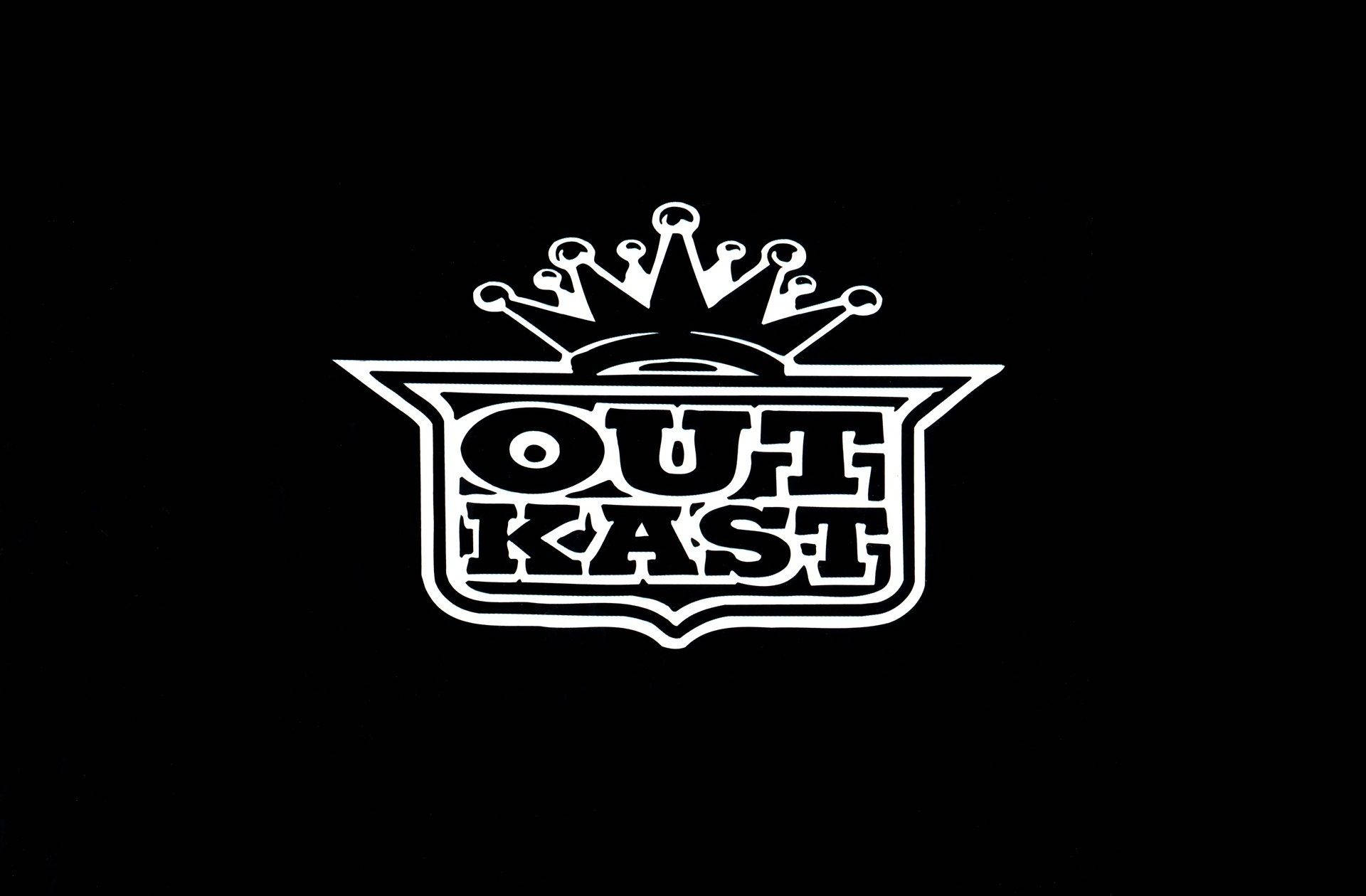  壁紙 — 一個大膽的白色OutKast標誌，帶有皇冠，居中放置在純黑色背景上。