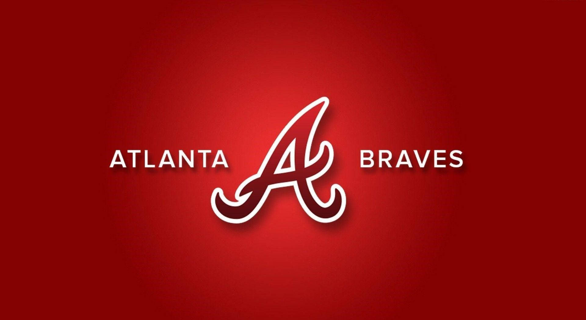 Braves 桌布 壁紙 — 一個大膽的白色亞特蘭大勇士隊標誌，中心為風格化的「A」，背景為豐富的紅色漸變。