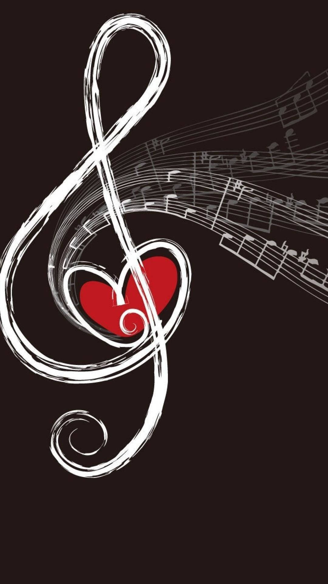 Music Notes 桌布 壁紙 — 一個大膽的白色高音譜號在一個充滿活力的紅色心形周圍旋轉，音符從中流出，背景為深棕色。