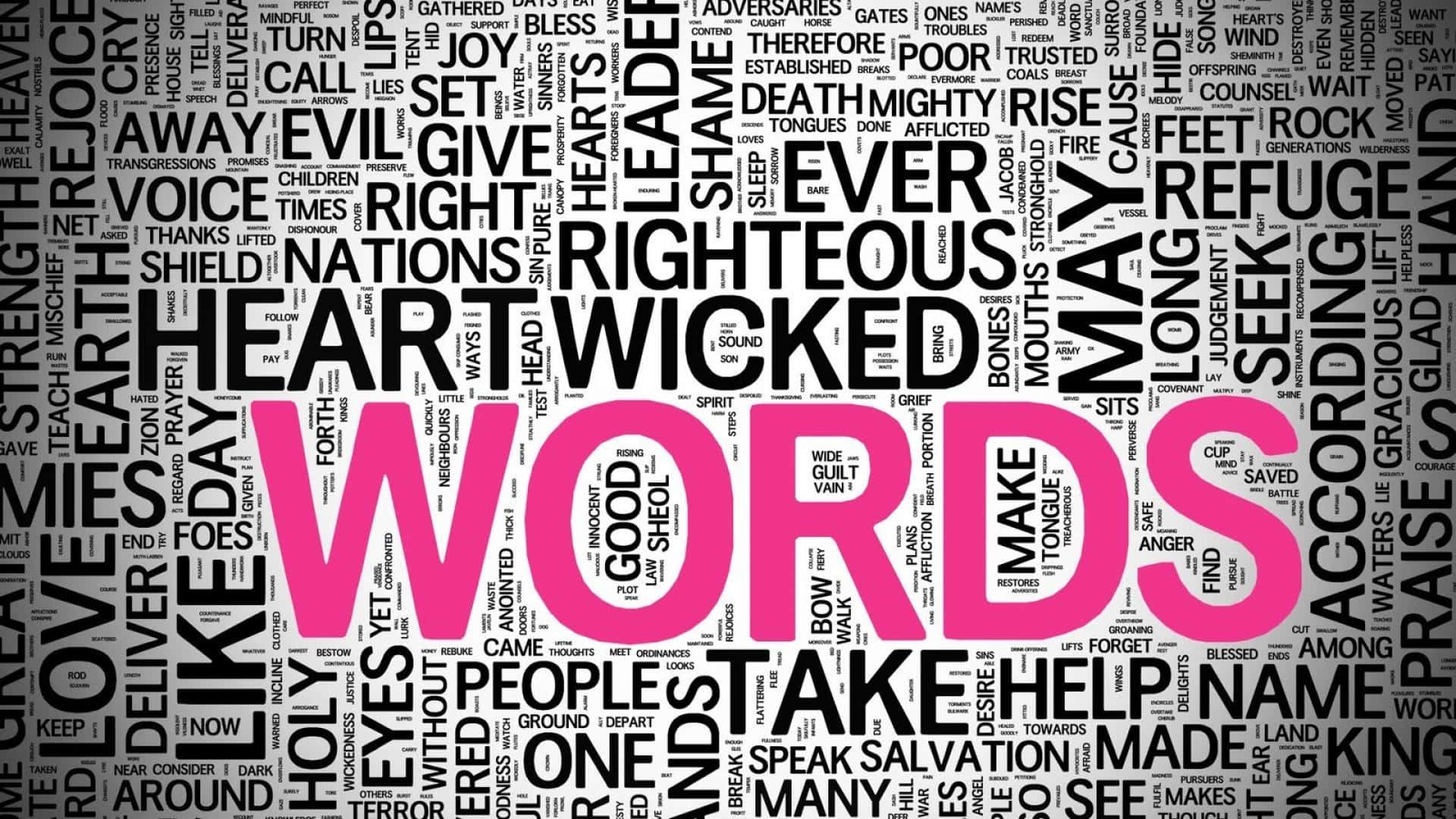 Vocabulary 桌布 壁紙 — 一個大膽的粉紅色「WORDS」文字主導了黑色背景，背景上充滿了較小的白色宗教和勵志短語，字體多樣。