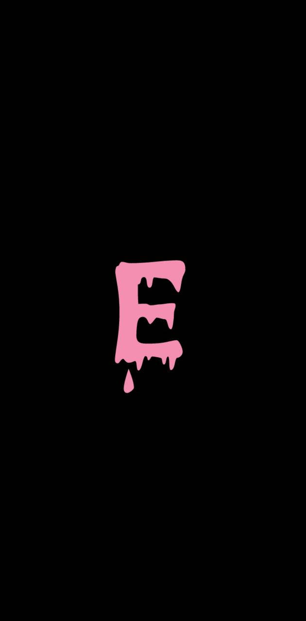 E 桌布 壁紙 — 一個大膽的粉紅色滴落字母E，居中在純黑色背景上。