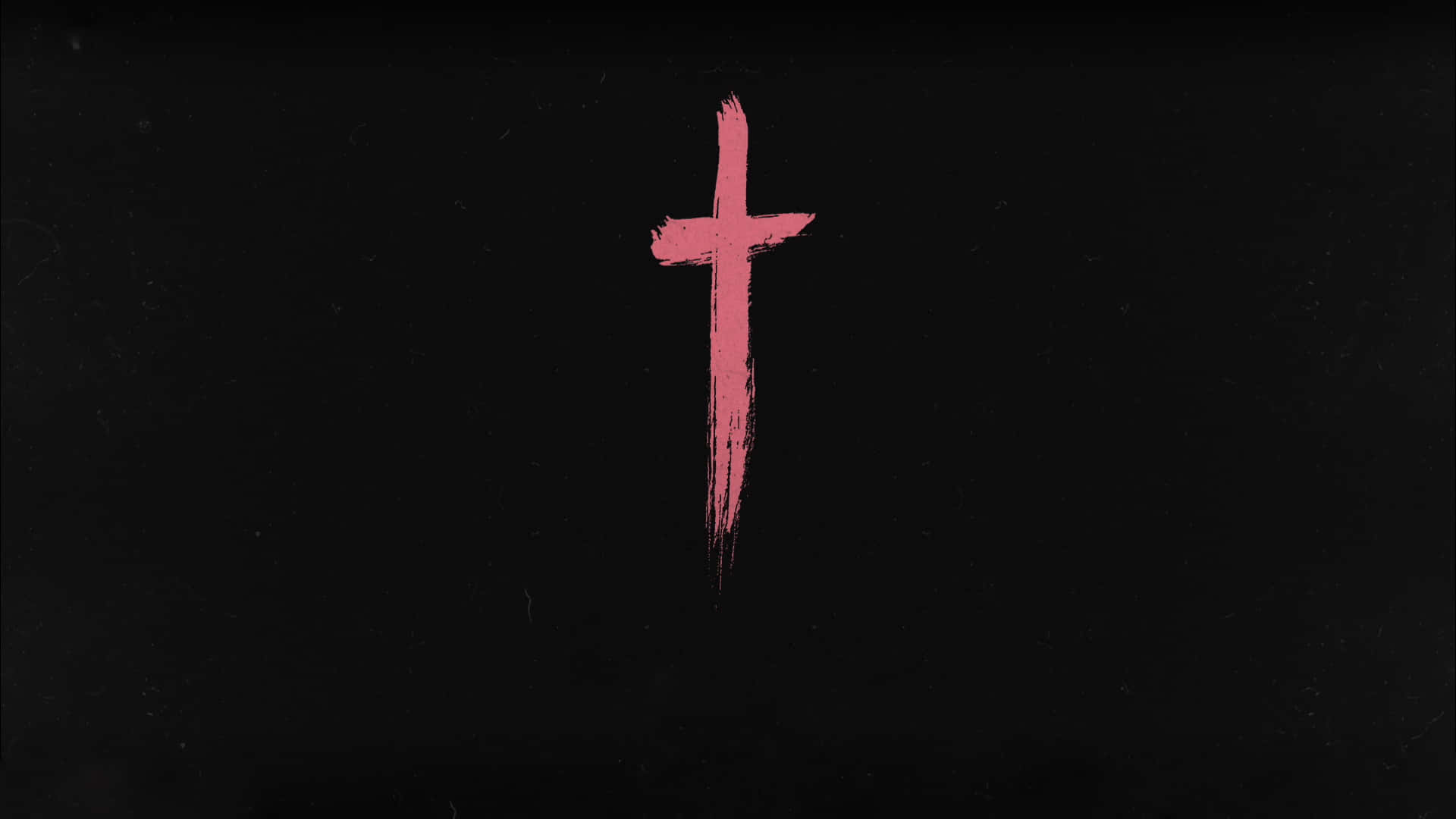 Pink Cross 桌布 壁紙 — 一個大膽的粉紅色筆觸十字架居中放置在帶有細微顆粒的紋理黑色背景上。