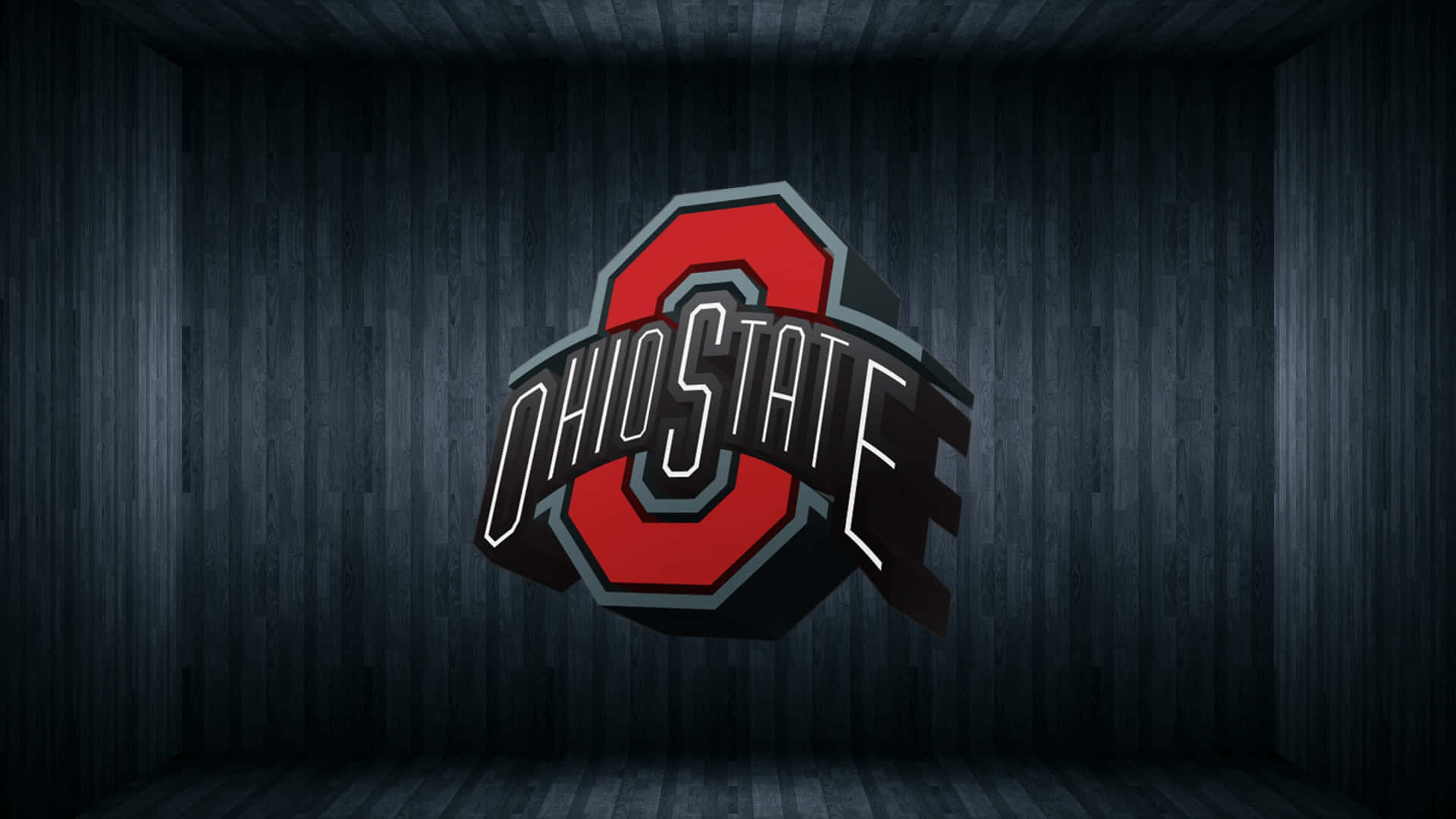 Cool Ohio State 桌布 壁紙 — 一個大膽的紅灰色俄亥俄州立大學標誌在黑暗的木鑲板房間中，在戲劇性的燈光下發光。