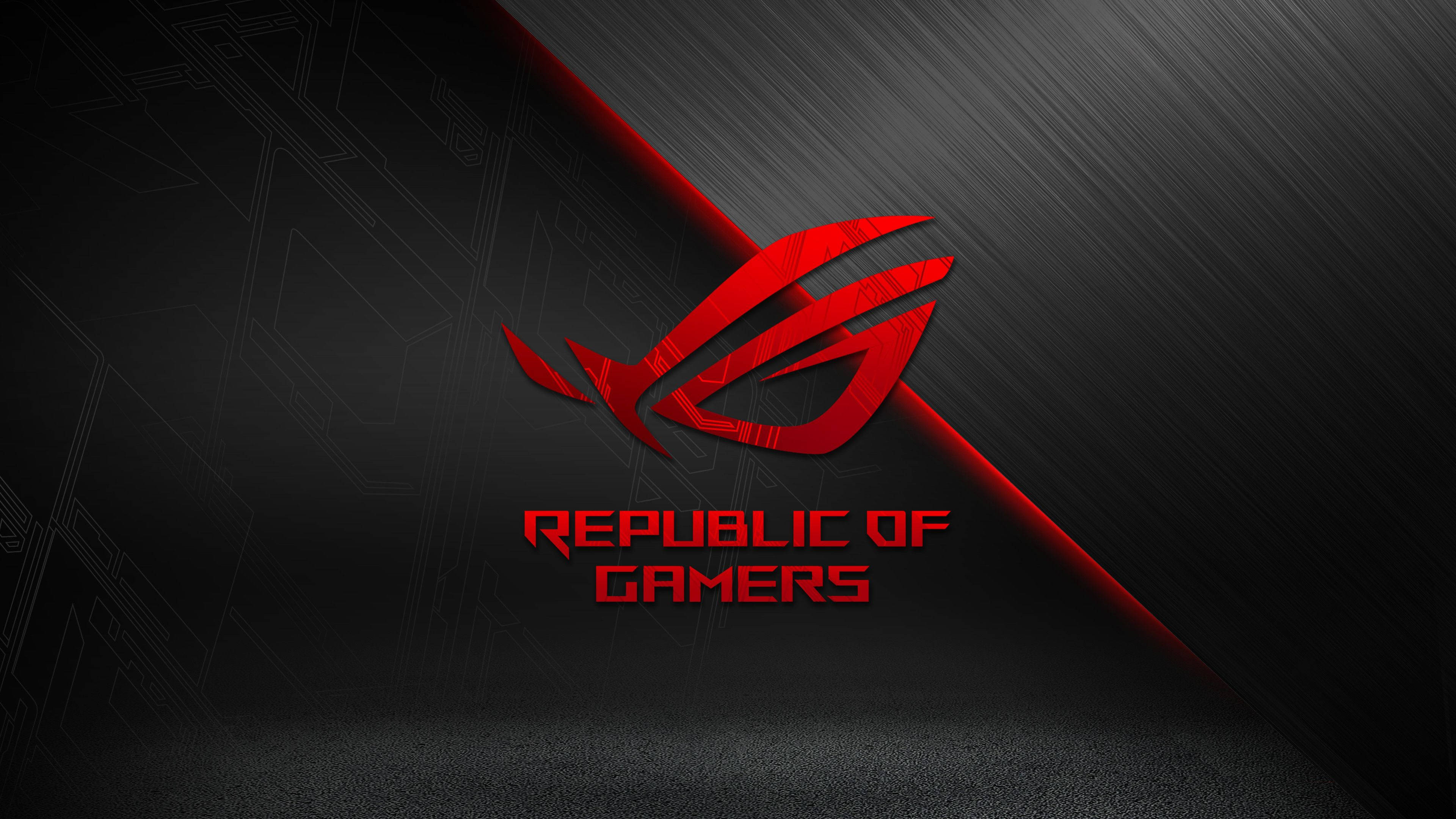 華碩 ROG 桌布 壁紙 — 一個大膽的紅色 Republic of Gamers 標誌在帶有斜向光條的時尚黑色紋理背景上發光。
