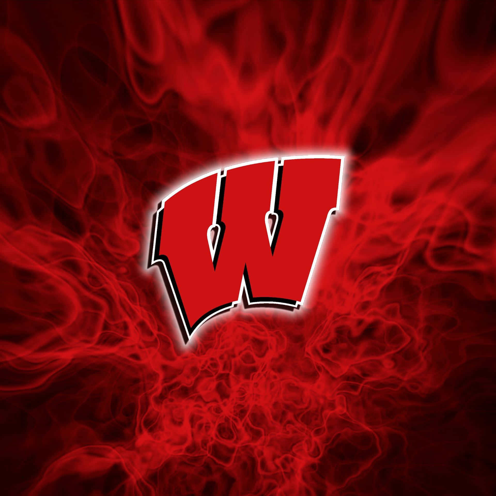 Wisconsin Badgers 桌布 壁紙 — 一個大膽的紅色「W」標誌，帶有白色輪廓，從深紅色背景上的旋轉深紅色煙霧中浮現。