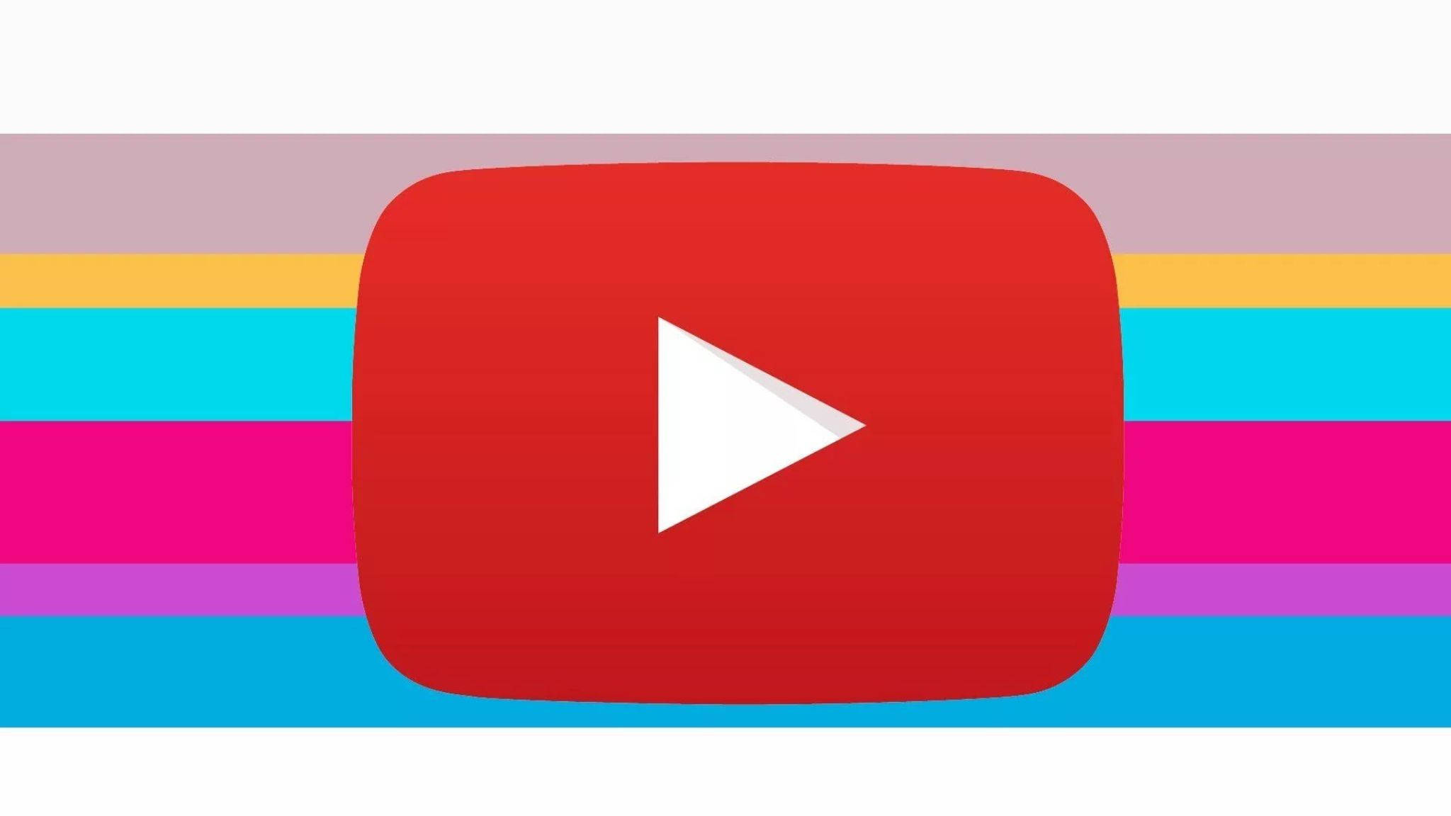 彩色動圖 桌布 壁紙 — 一個大膽的紅色 YouTube 播放按鈕，居中在充滿活力的多色條紋背景上。