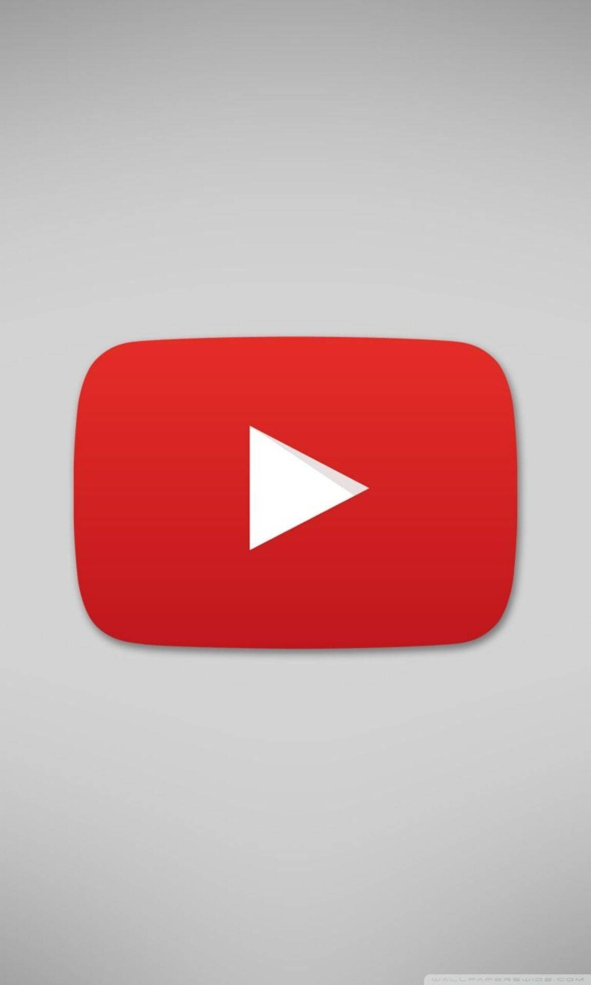 YouTube 桌布 壁紙 — 一個大膽的紅色 YouTube 播放按鈕圖示，居中在柔和的灰色漸變背景上。