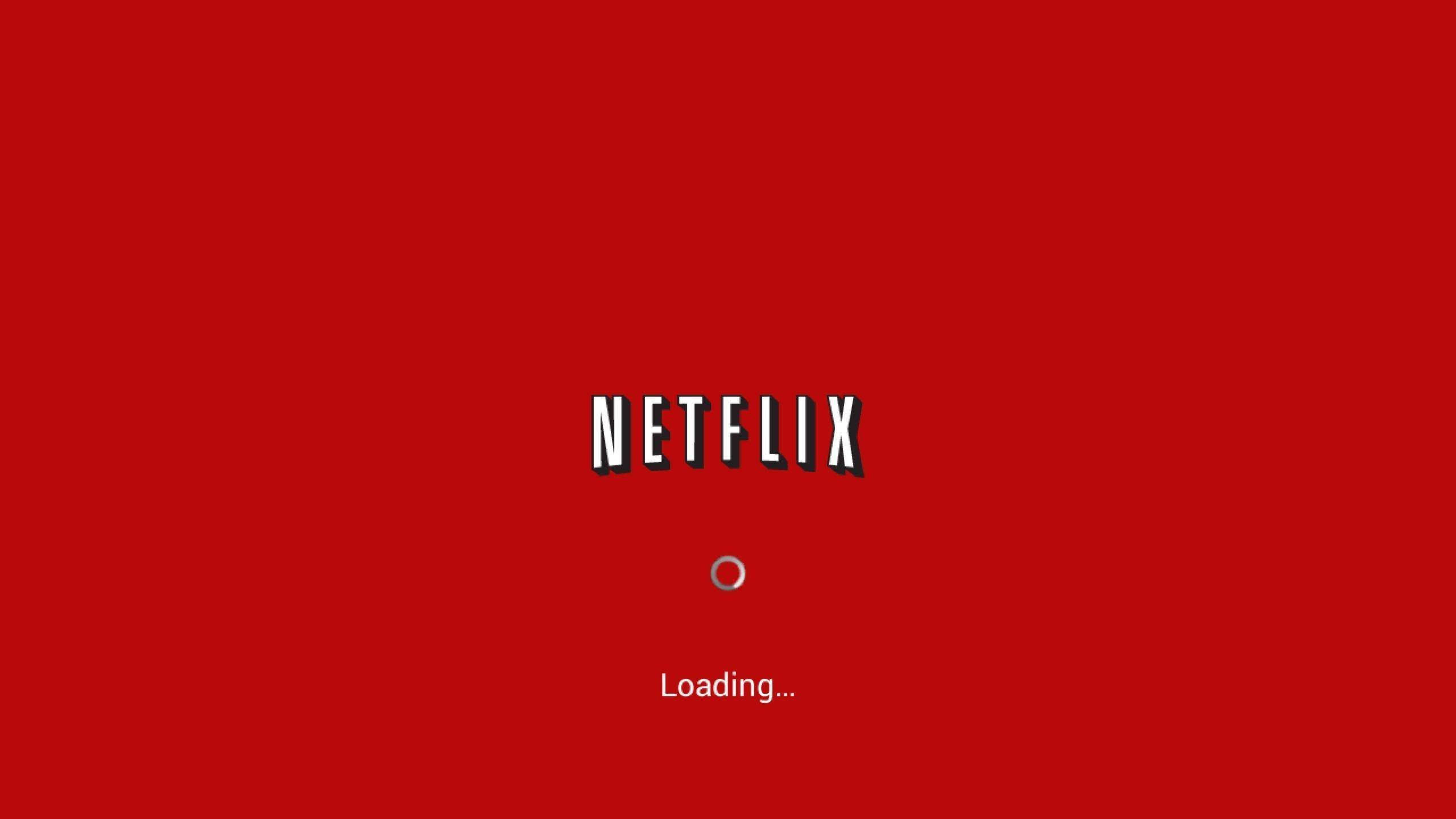Netflix 桌布 壁紙 — 一個大膽的紅色Netflix載入畫面，白色標誌和旋轉圓圈居中在純色背景上。