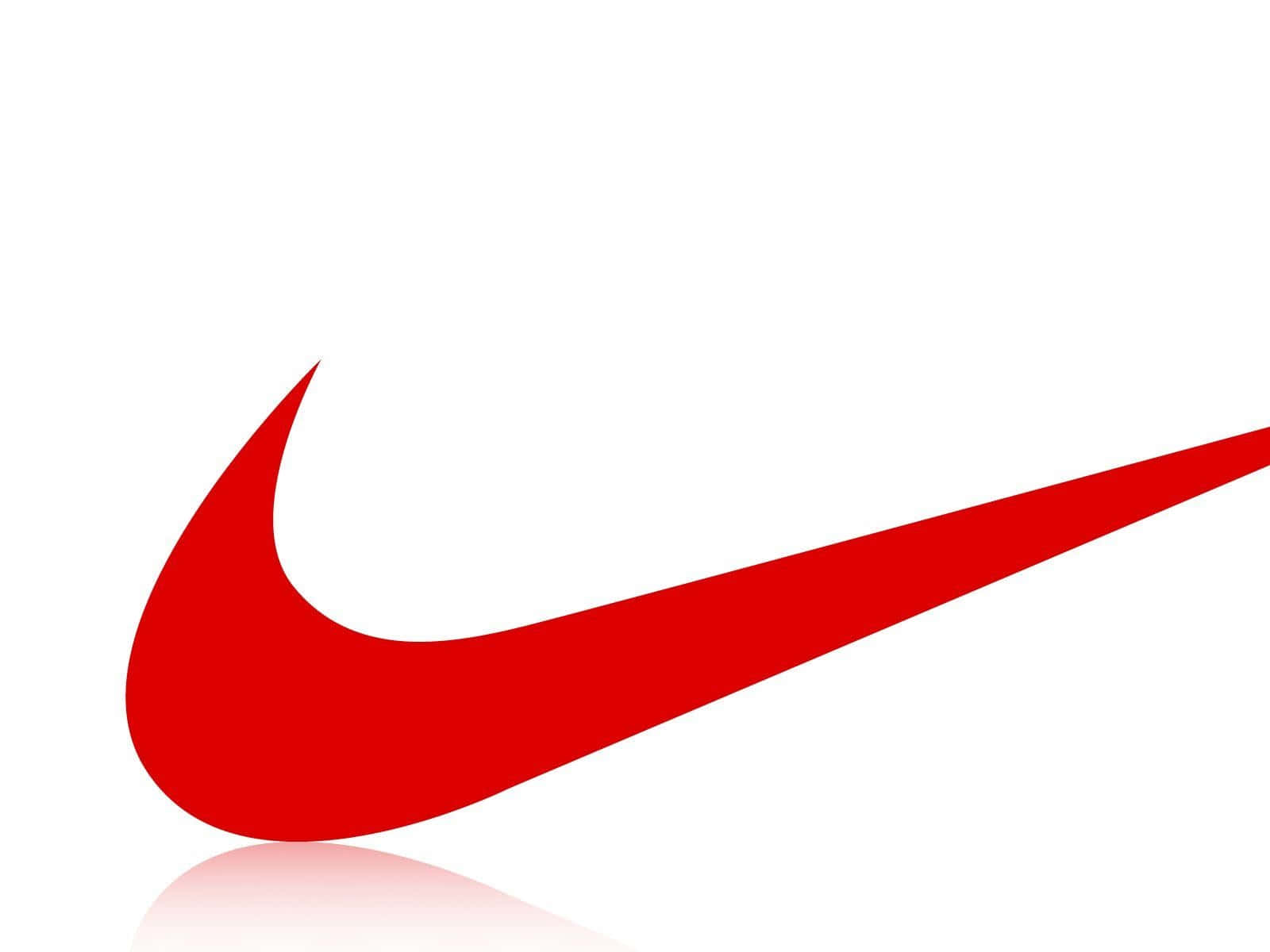 Red Nike 桌布 壁紙 — 一個大膽的紅色Nike swoosh標誌，在乾淨的白色背景上有微妙的倒影。