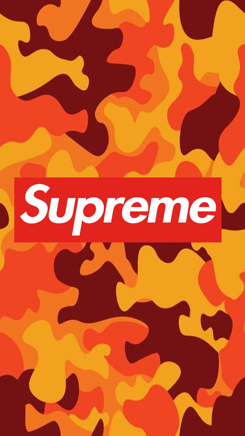 orange supreme 桌布 壁紙 — 一個大膽的紅色Supreme標誌，位於火橙色和深紅色的迷彩圖案中央。